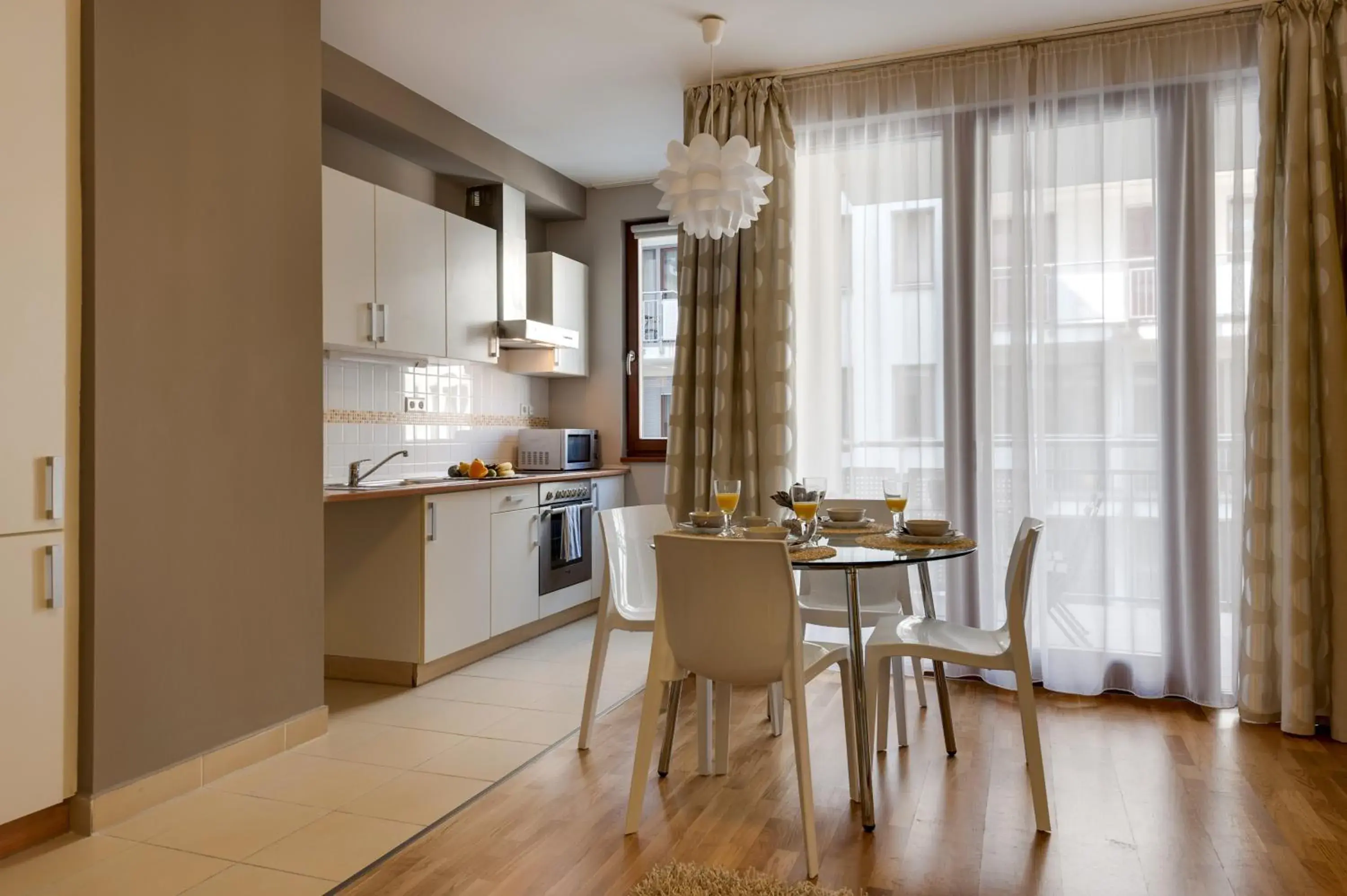 Dining area, Kitchen/Kitchenette in Central Passage Budapest Apartments