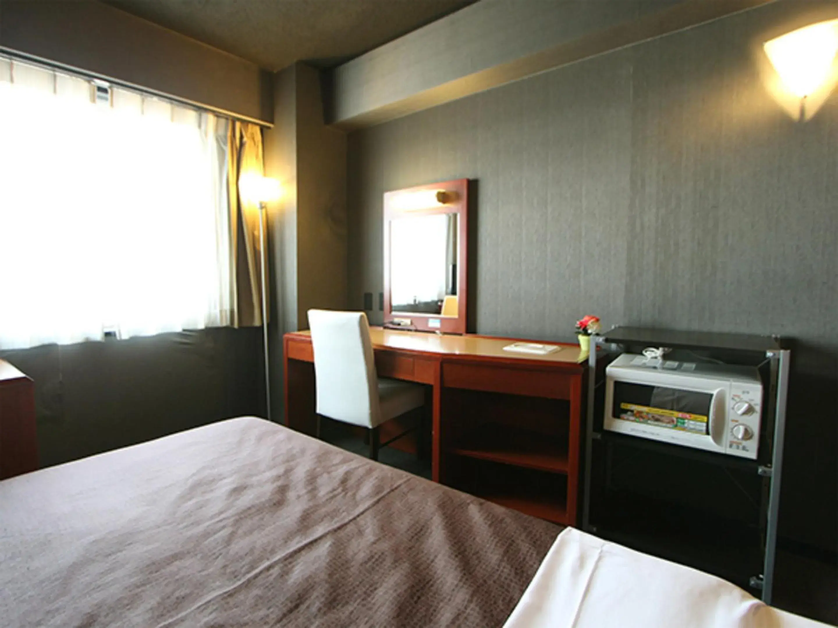 Bed in HOTEL LiVEMAX BUDGET Yokohama Tsurumi