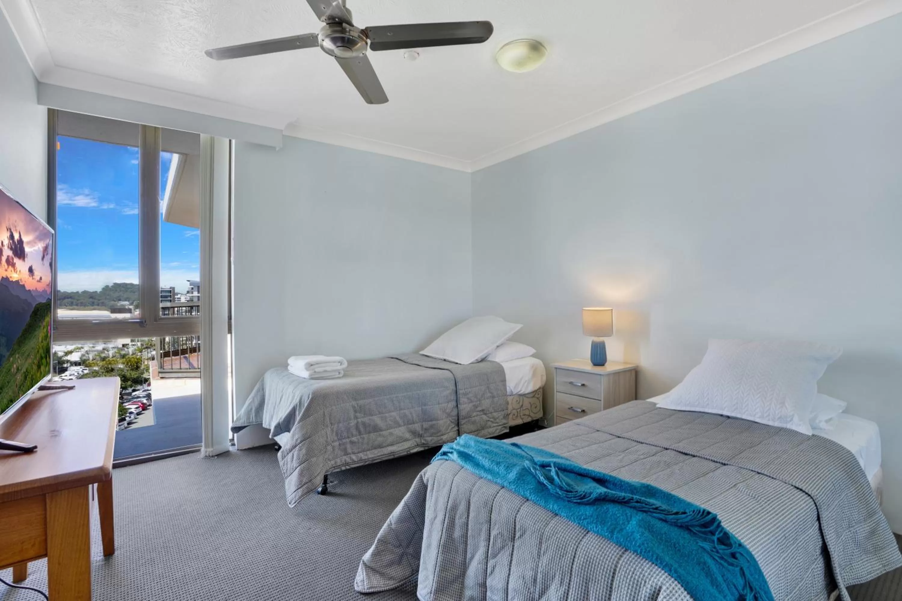 Bed in Beach Palms Holiday Apartments