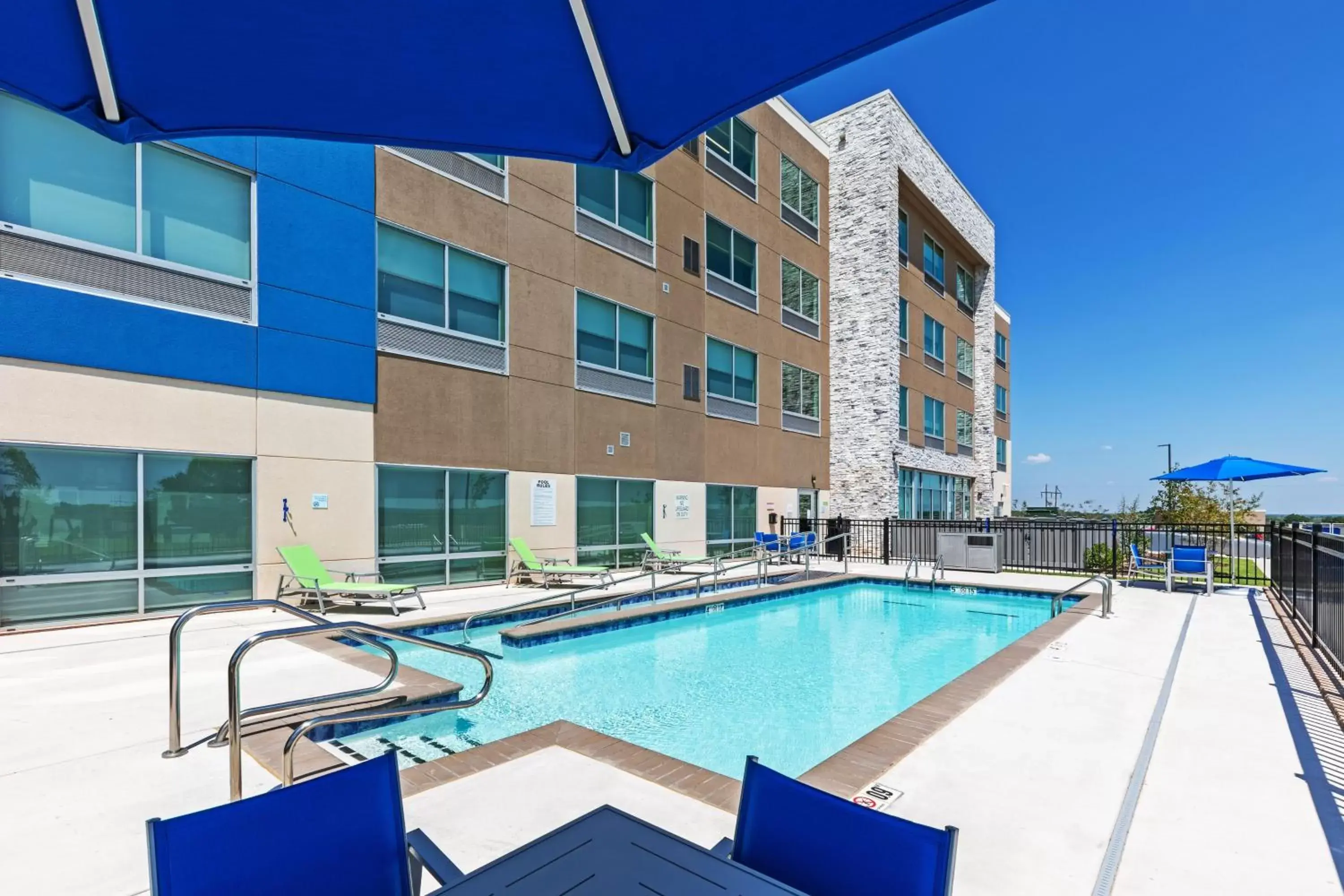 Swimming pool, Property Building in Holiday Inn Express & Suites Purcell, an IHG Hotel