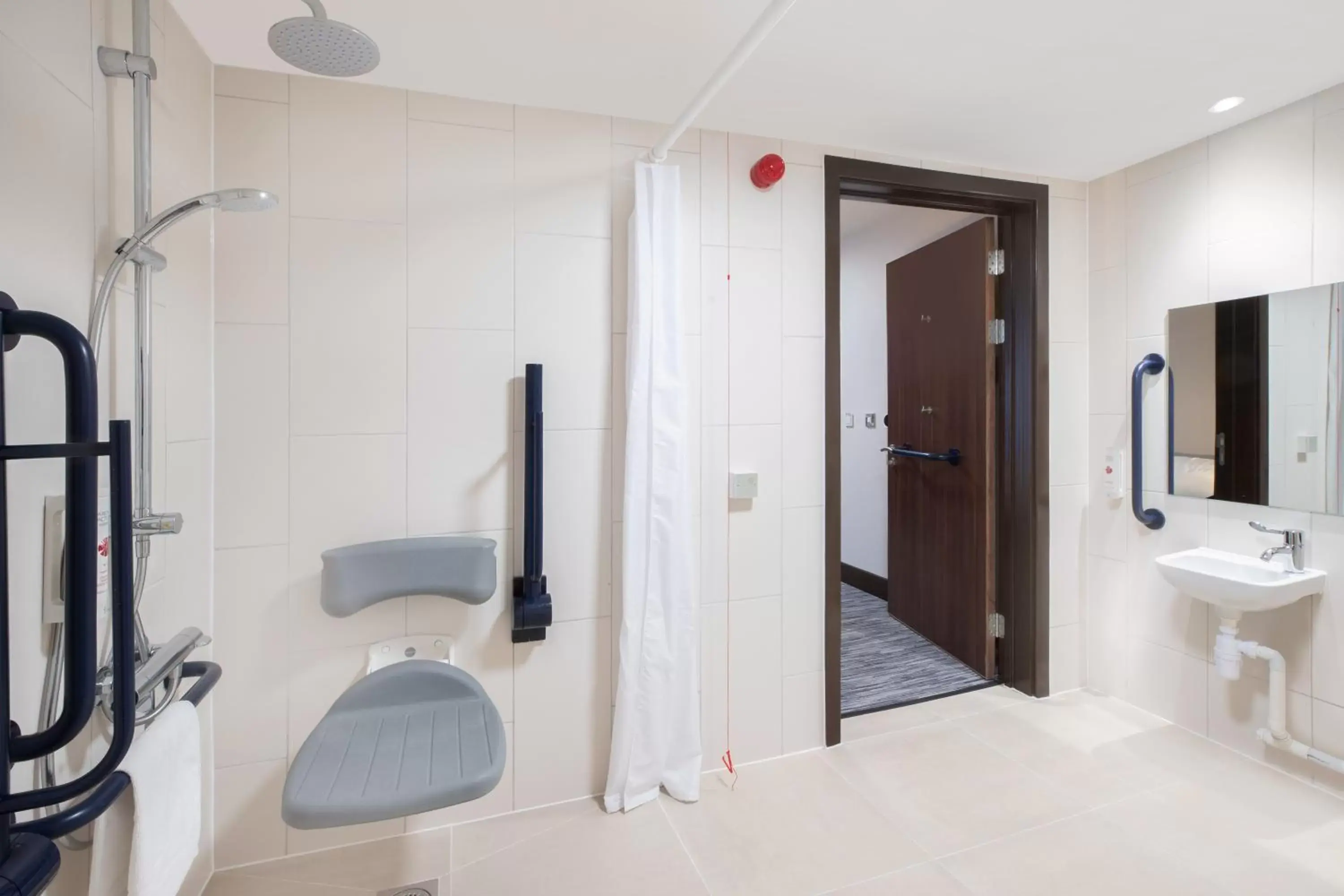 acessibility, Bathroom in Ramada by Wyndham Leeds East