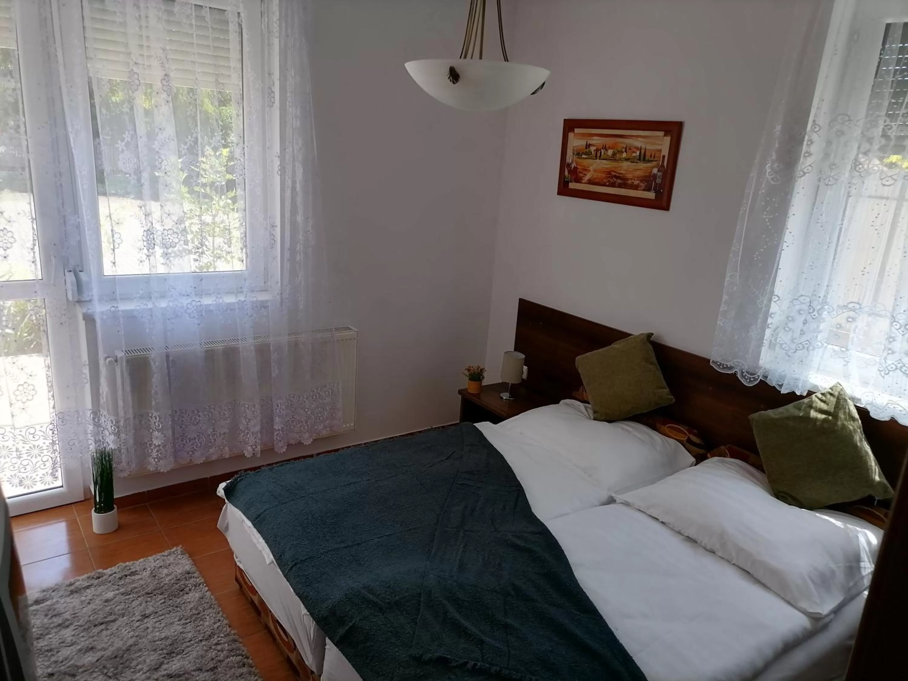 Bed in Aqua Oazis Apartman
