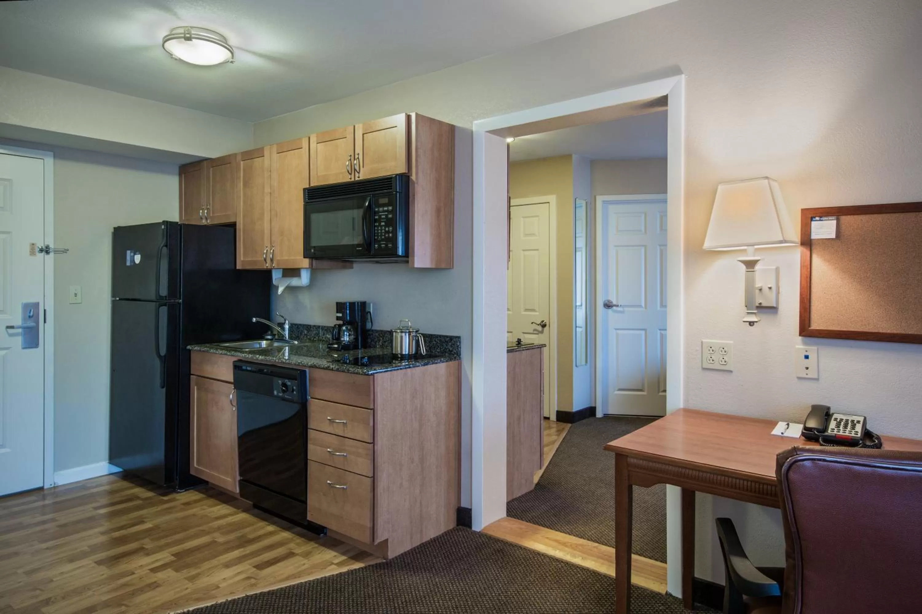 Bedroom in Candlewood Suites Windsor Locks by IHG
