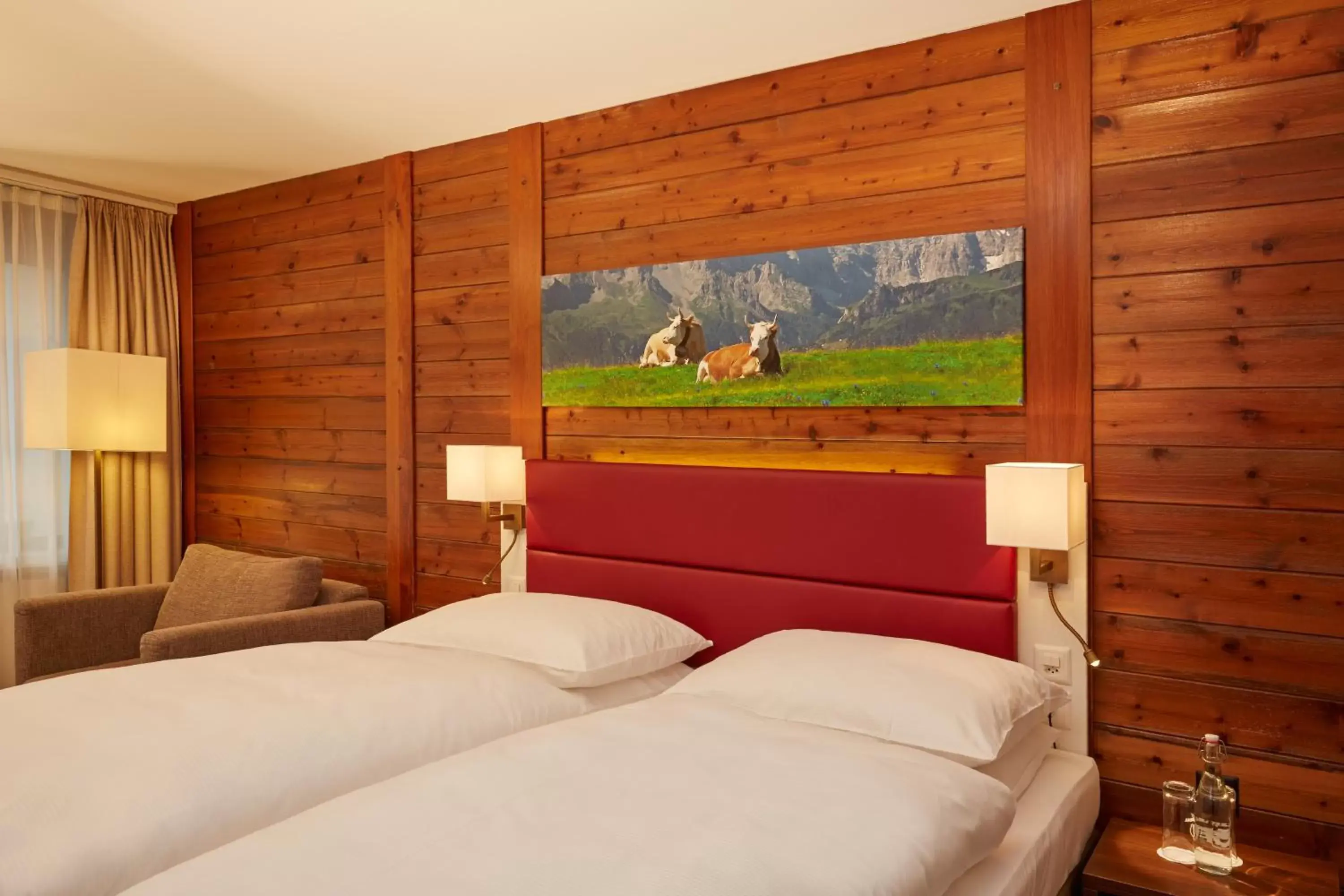 Photo of the whole room, Bed in H+ Hotel & SPA Engelberg