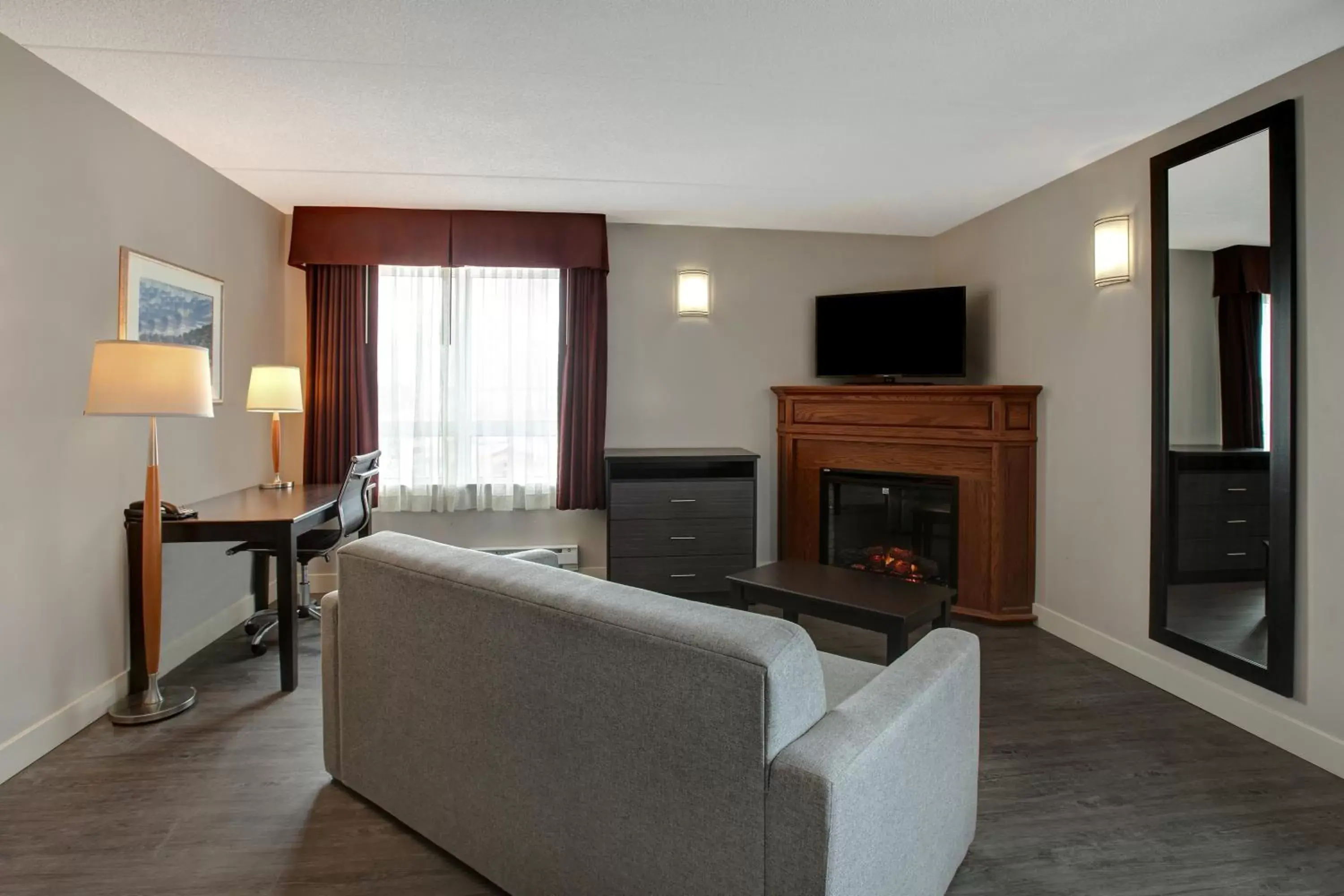 flat iron, Seating Area in Days Inn & Suites by Wyndham Collingwood
