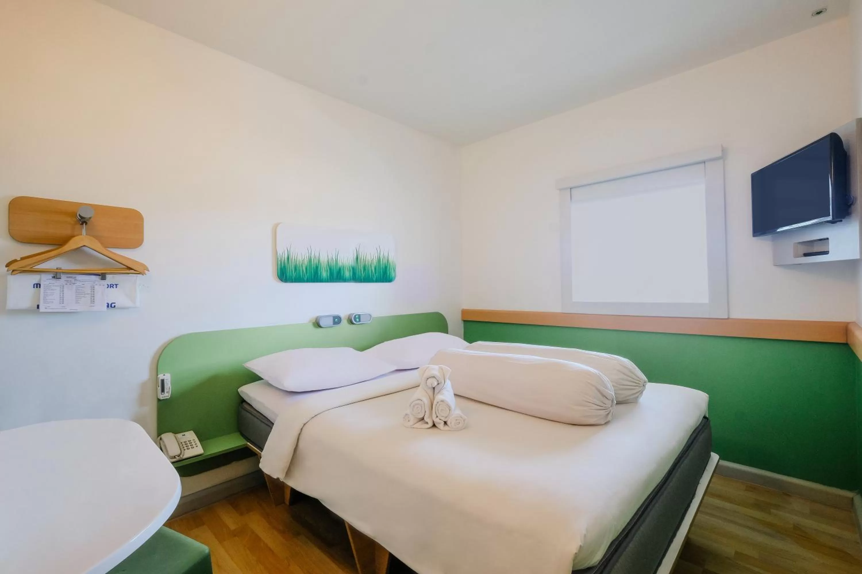 Bed in Cordia Hotel Makassar Airport