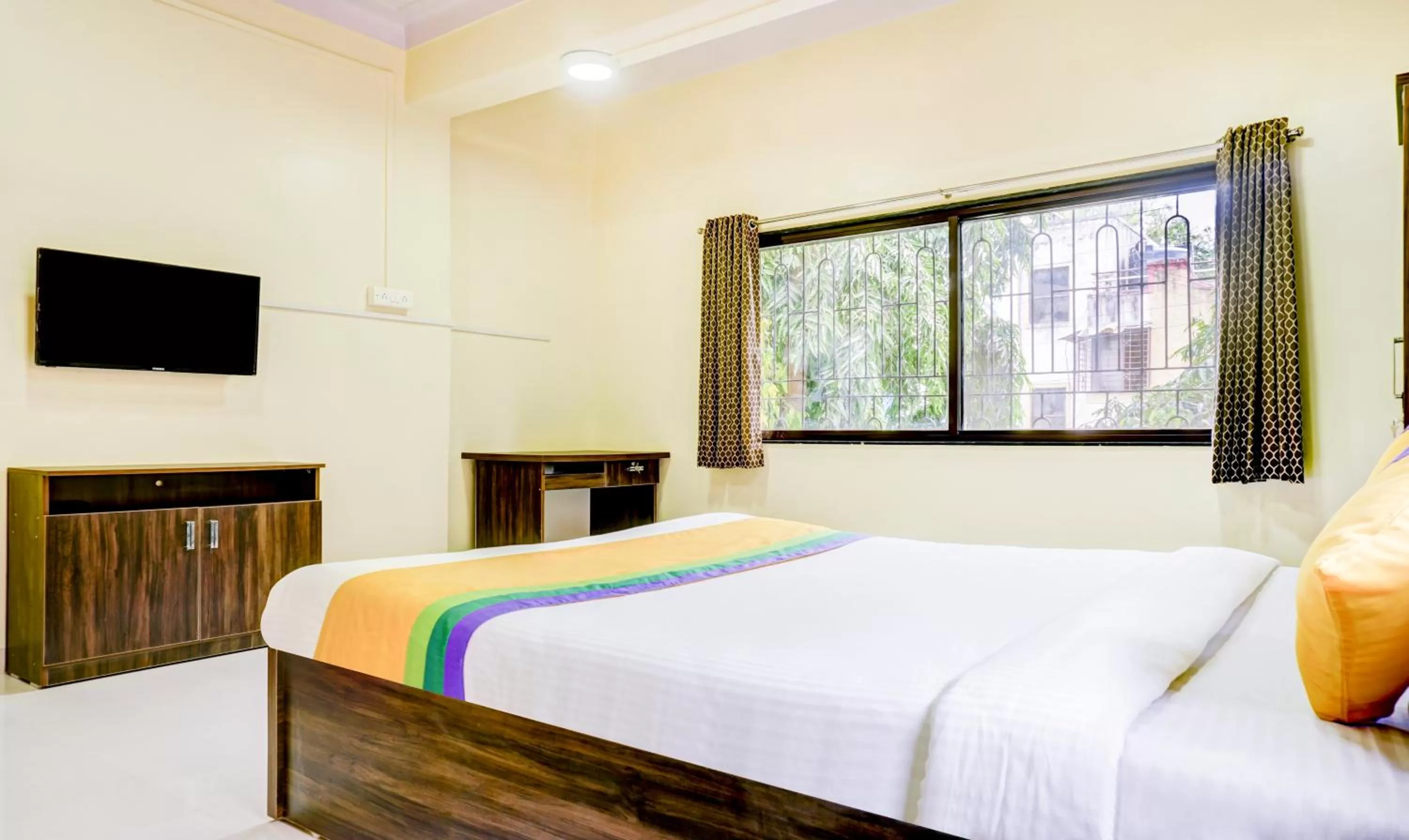 TV and multimedia, Bed in Hotel Bestow Inn Koregaon Park Pune -Near Osho Ashram