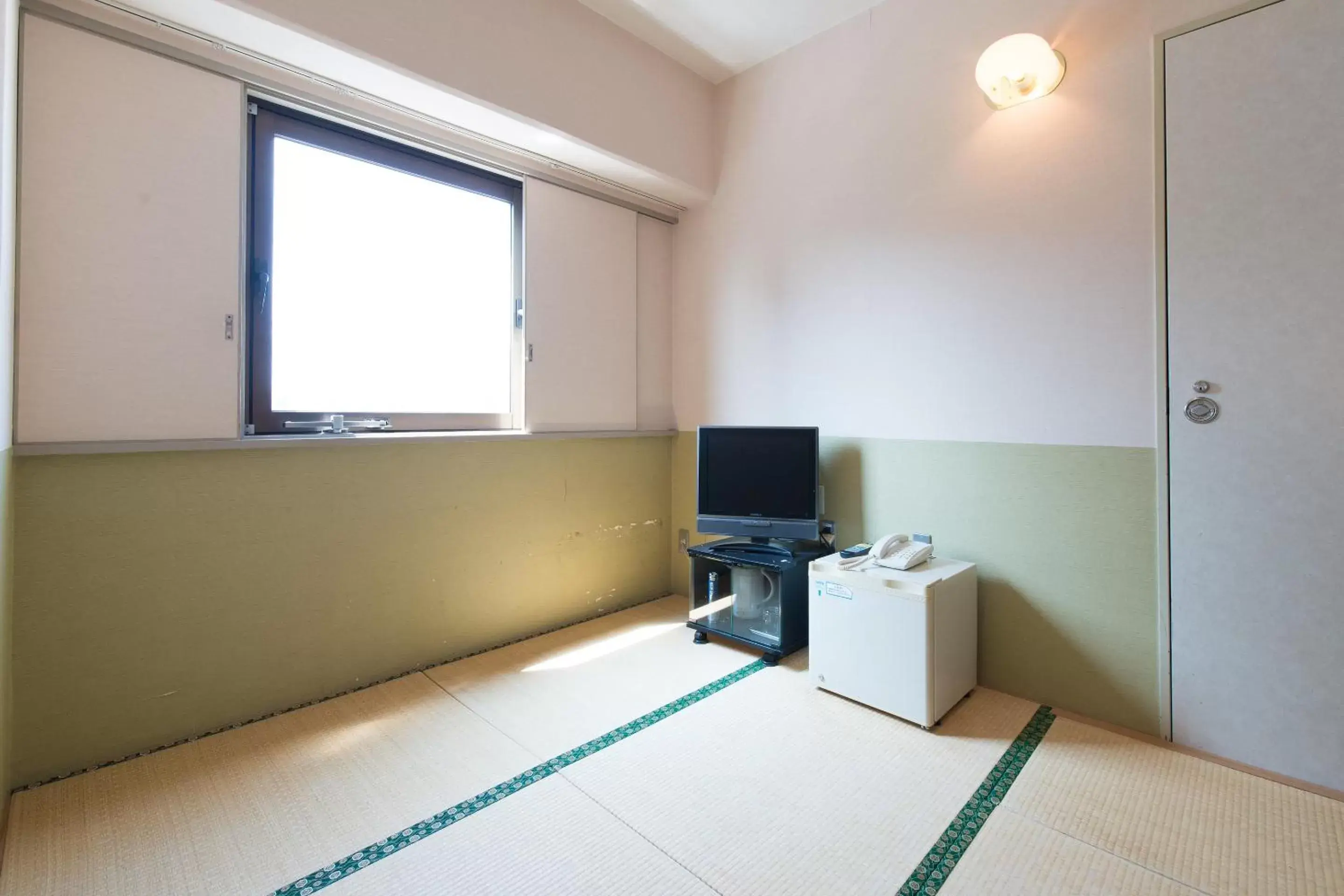 Photo of the whole room, TV/Entertainment Center in Tabist Hotel Tetora Kitakyushu