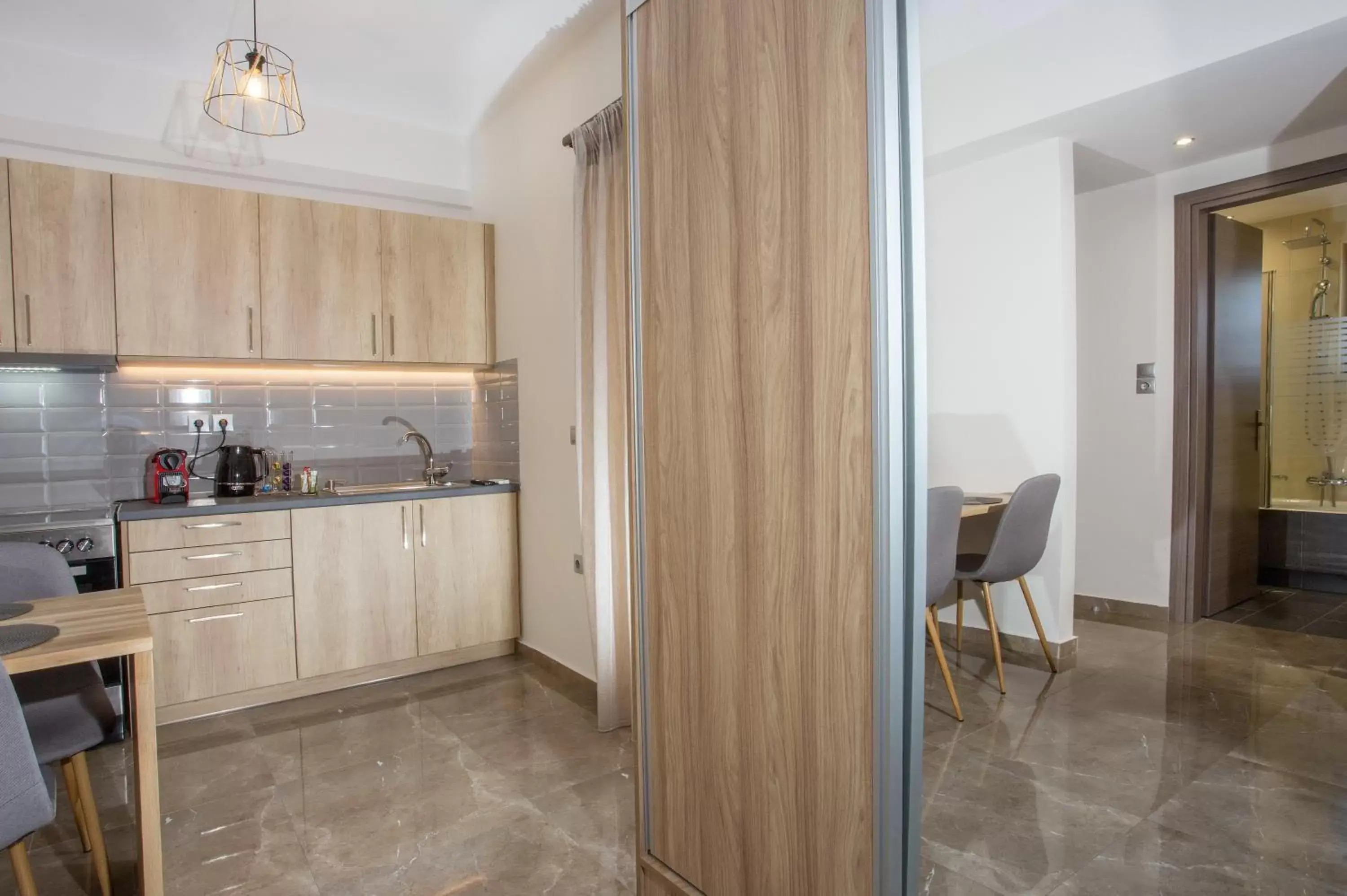 wardrobe, Kitchen/Kitchenette in Vardians Villas & Suites