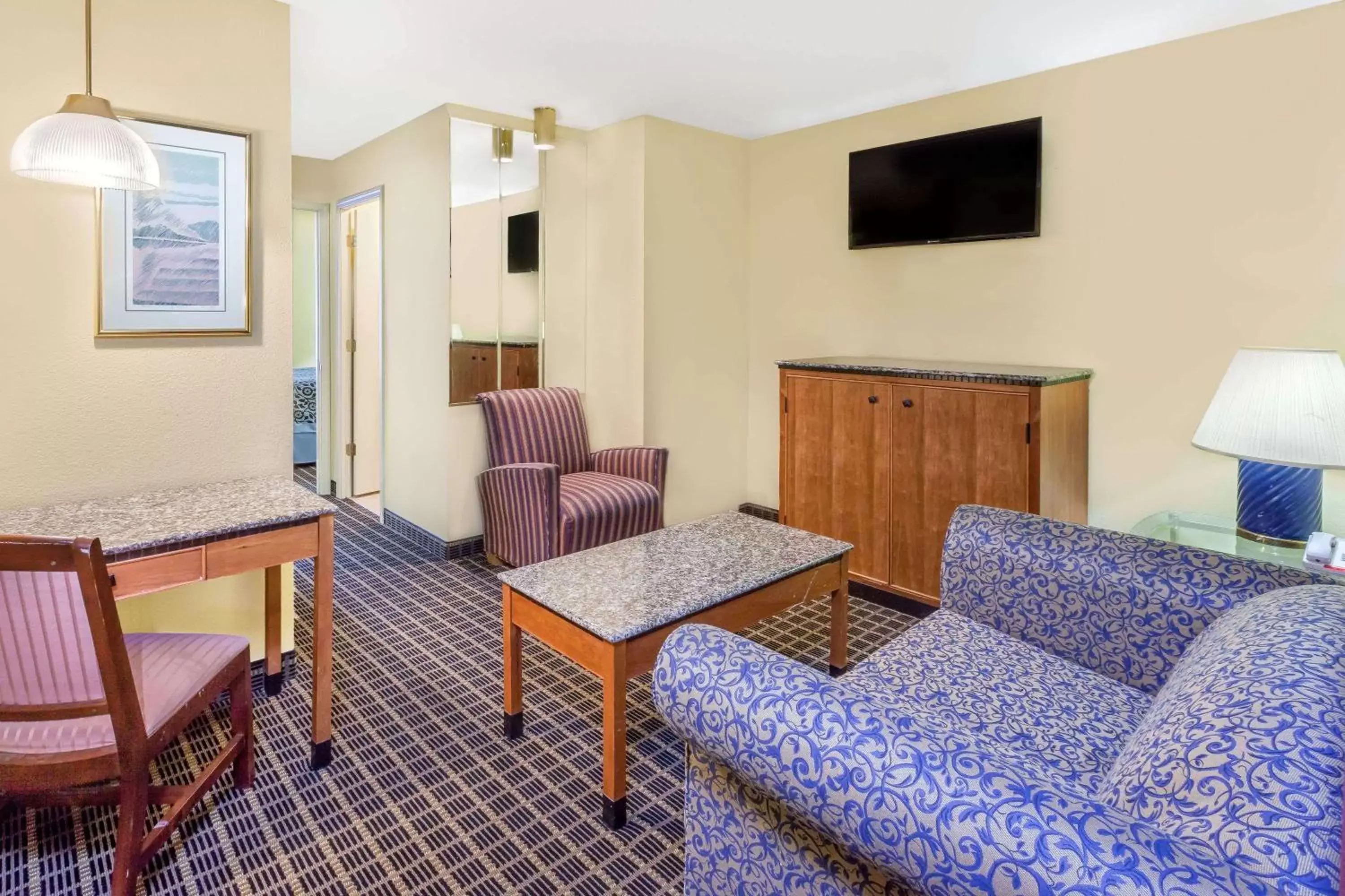 Photo of the whole room, Seating Area in Days Inn & Suites by Wyndham Kalamazoo