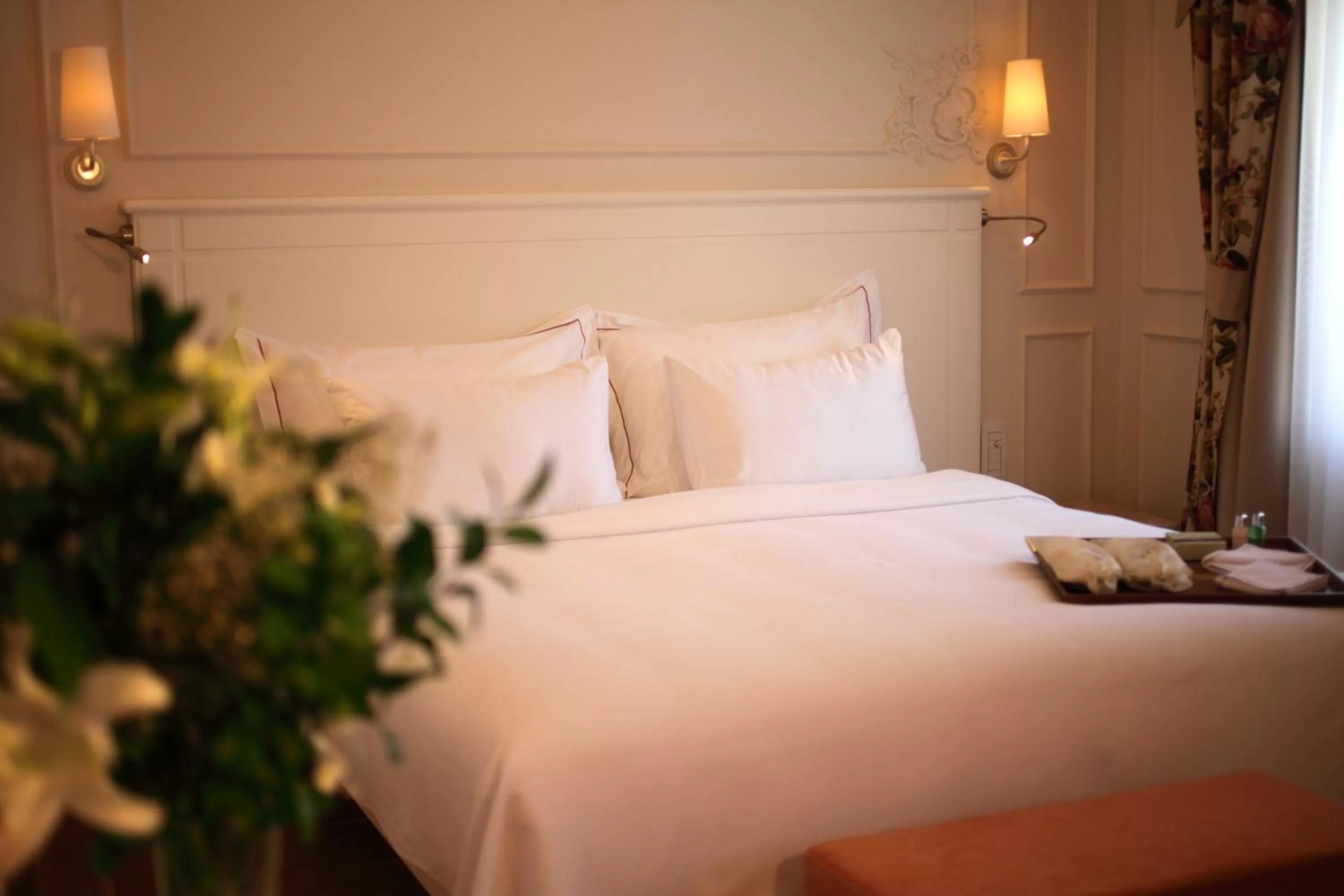 Bed in Corinne Art & Boutique Hotel