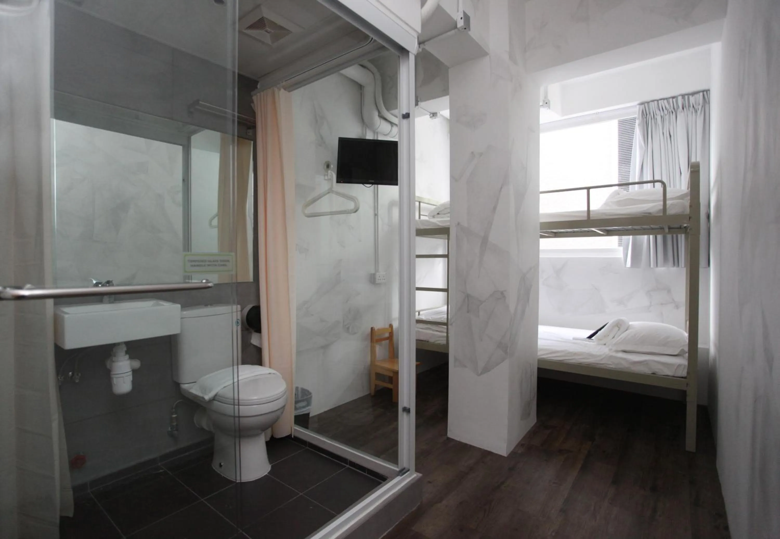 Photo of the whole room in Hop Inn