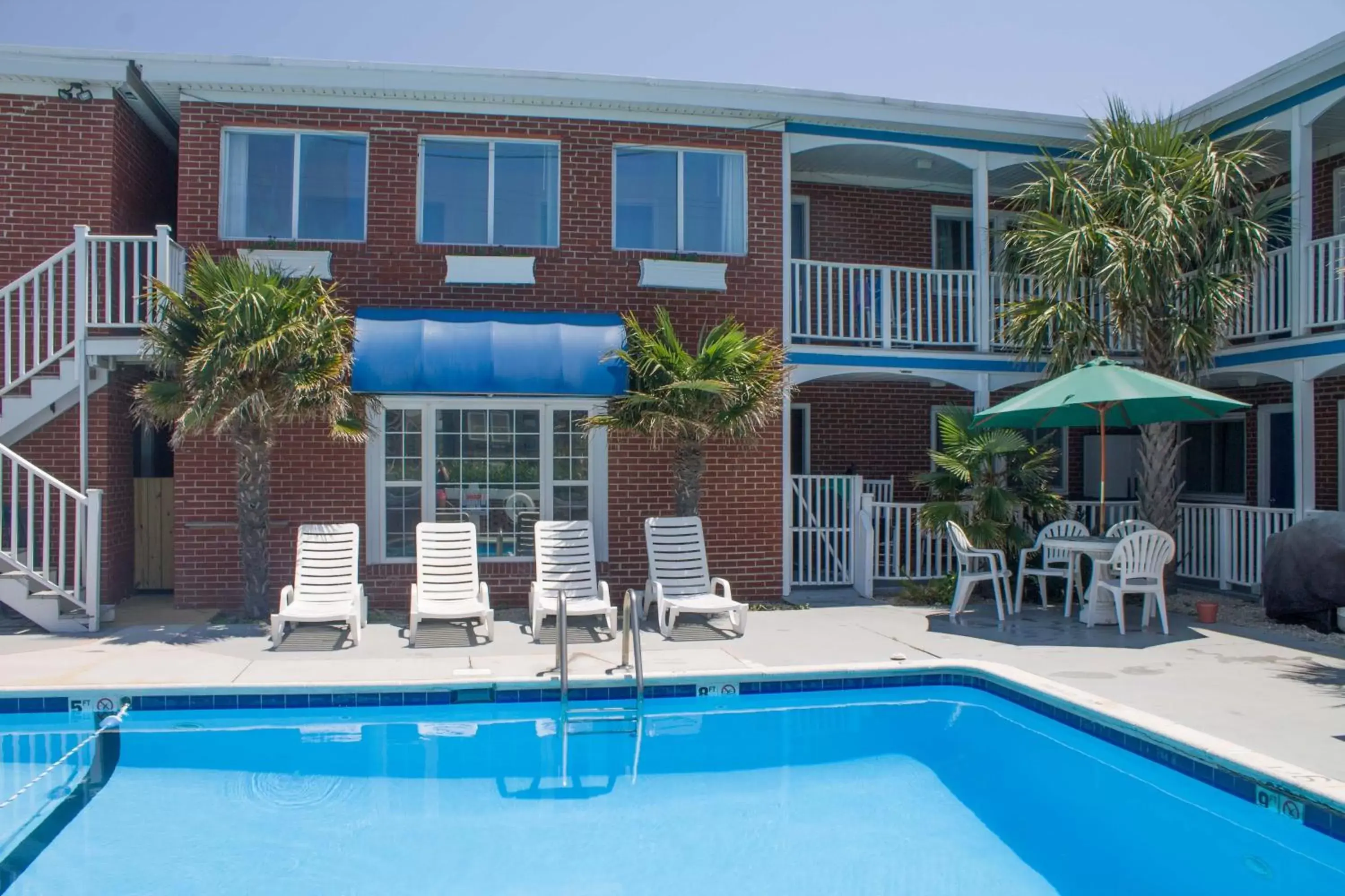 Swimming pool, Property Building in Colonial Inn