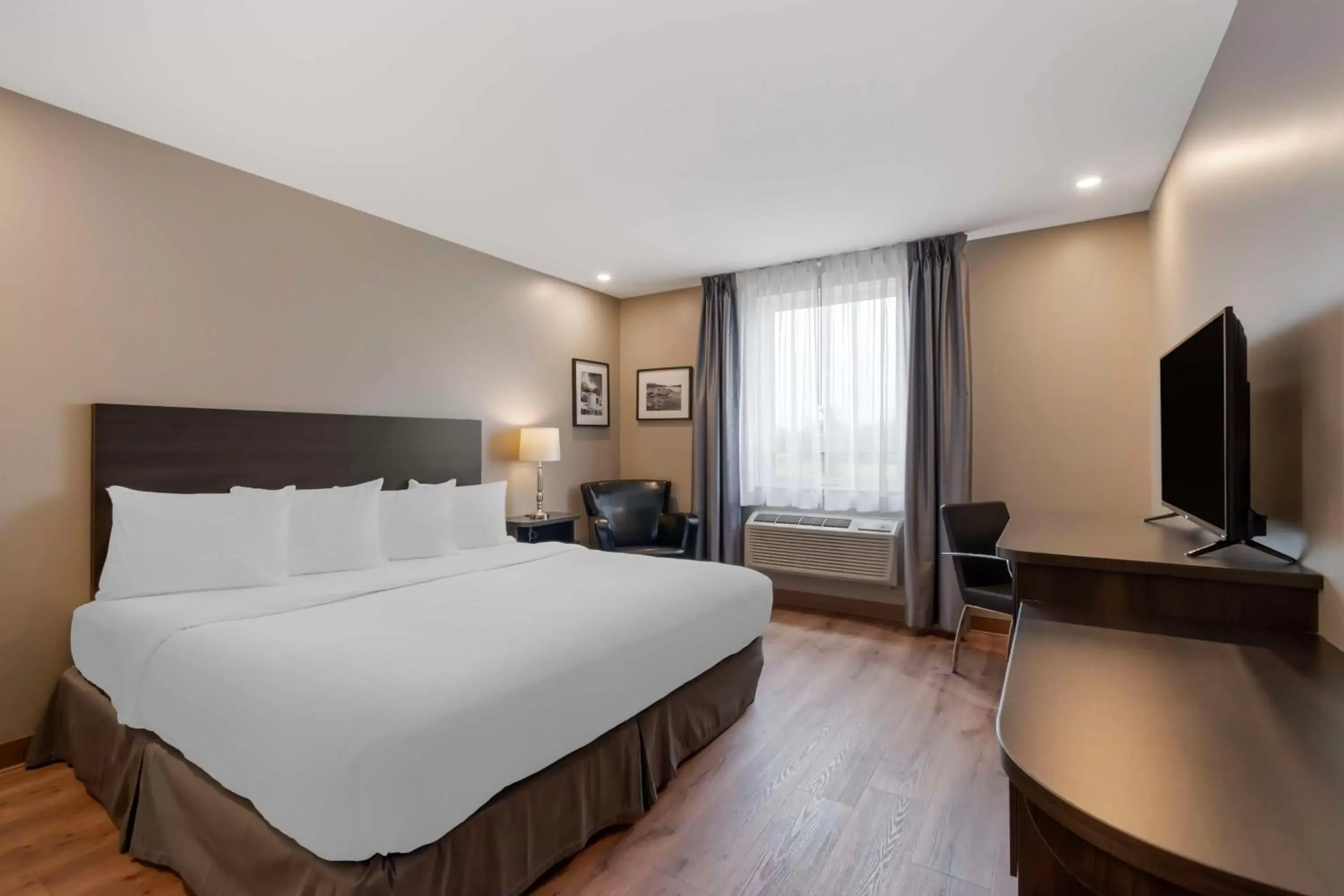 Bedroom in Villa Inn & Suites - SureStay Collection by Best Western