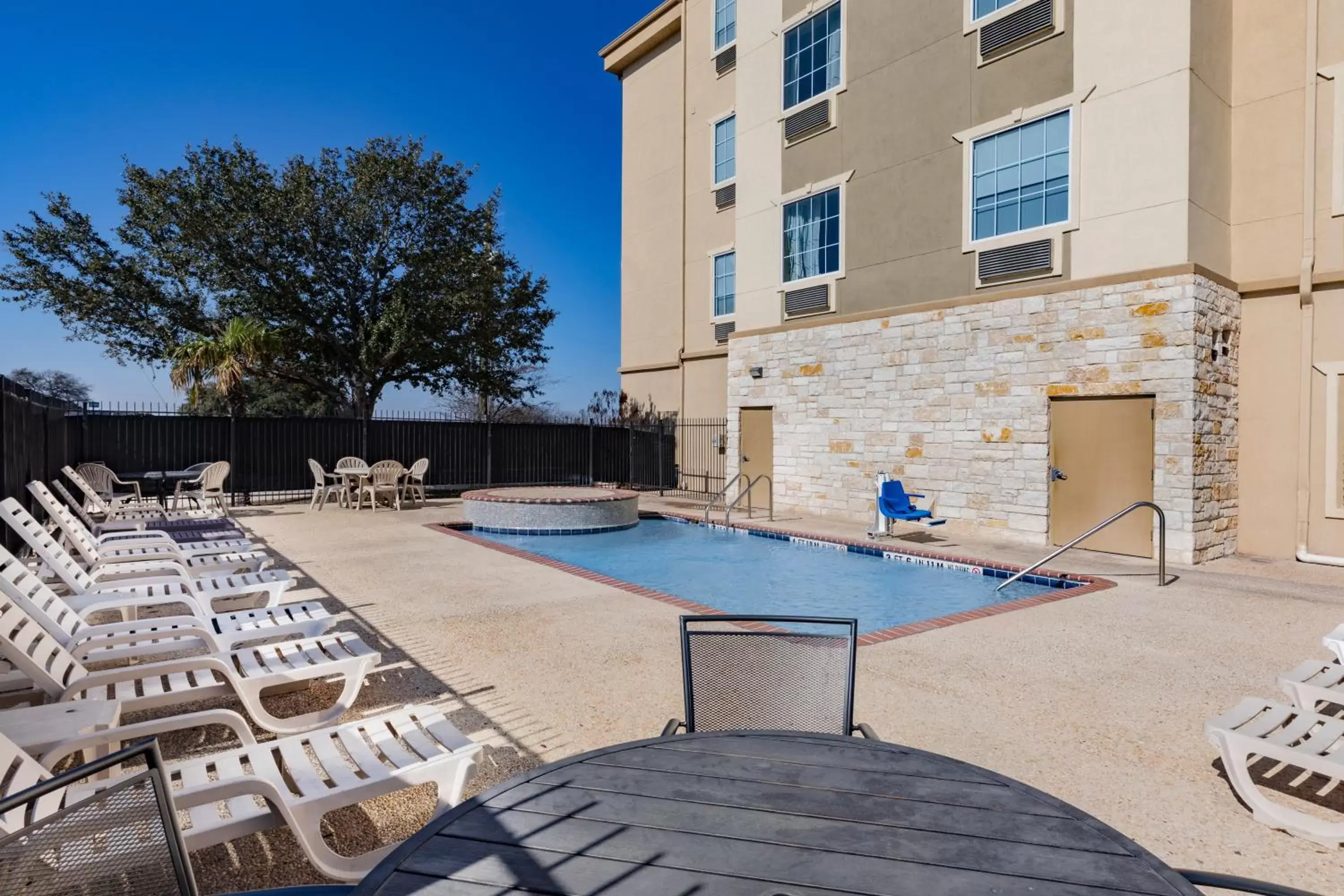 Swimming Pool in Days Inn & Suites by Wyndham San Antonio near AT&T Center