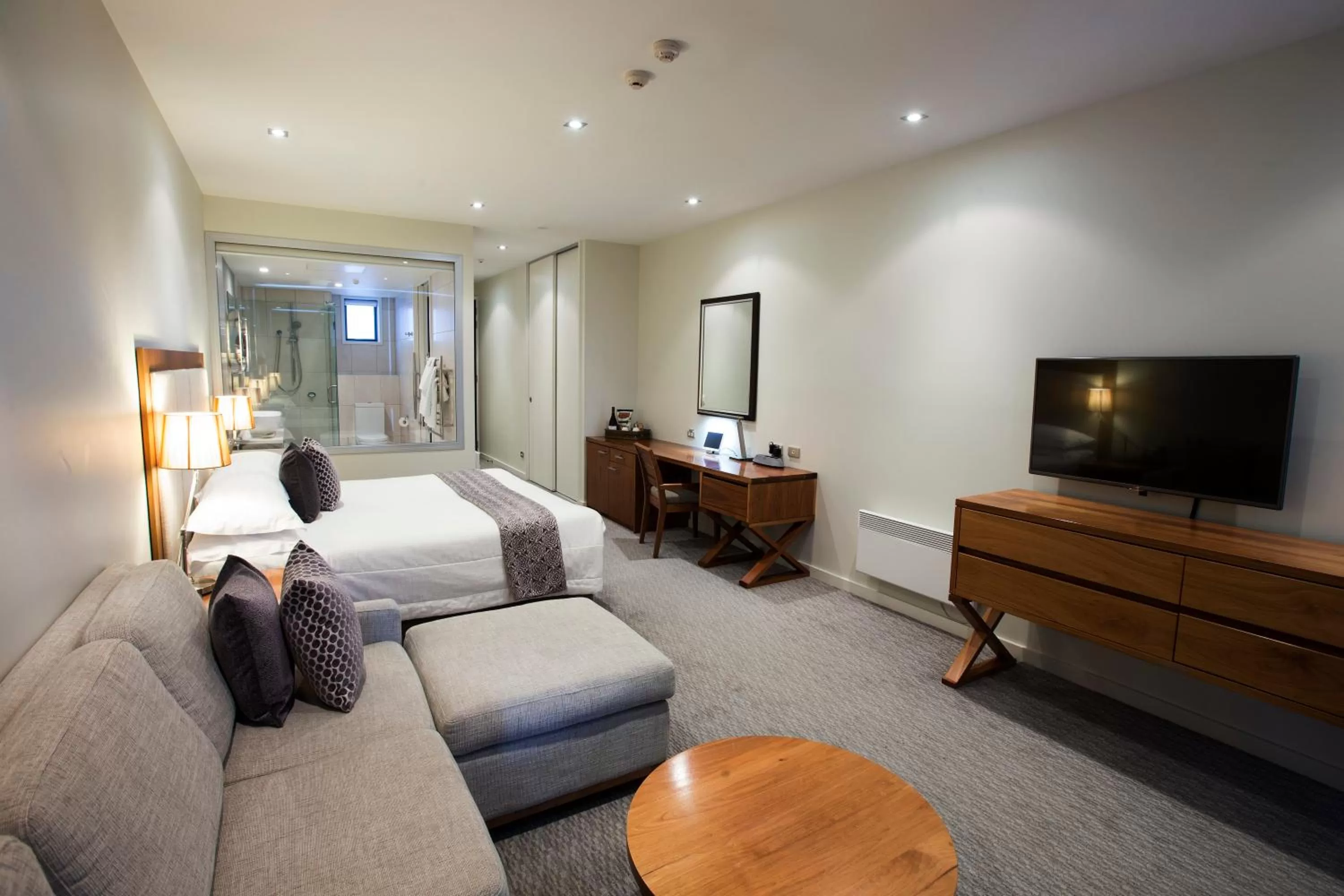 Bed in The Rees Hotel & Luxury Apartments