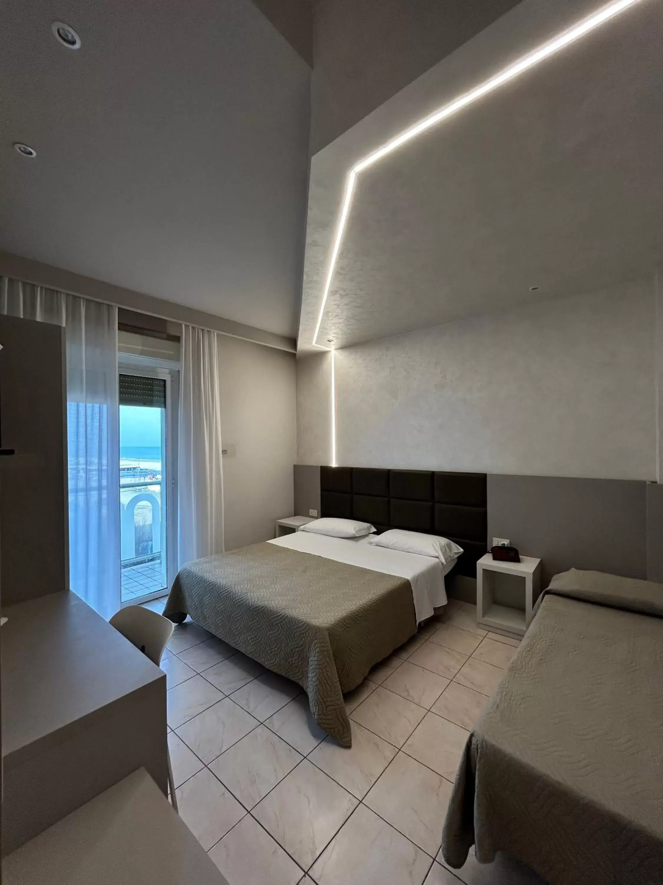 Property building, Bed in Hotel Adria