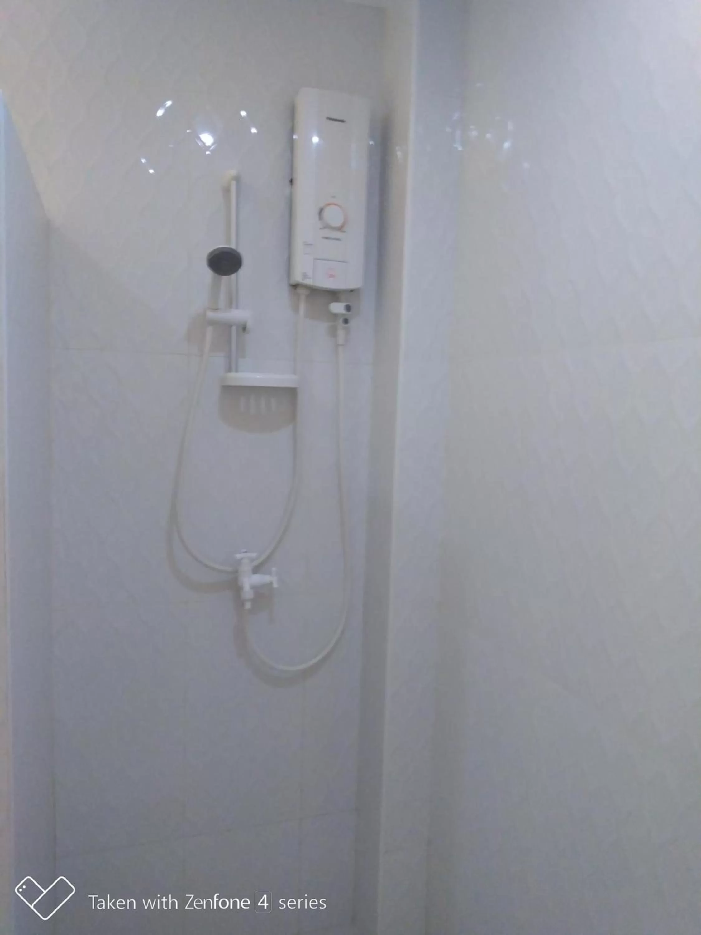 Toilet in D & B BLUESTAR BEACH RESORT