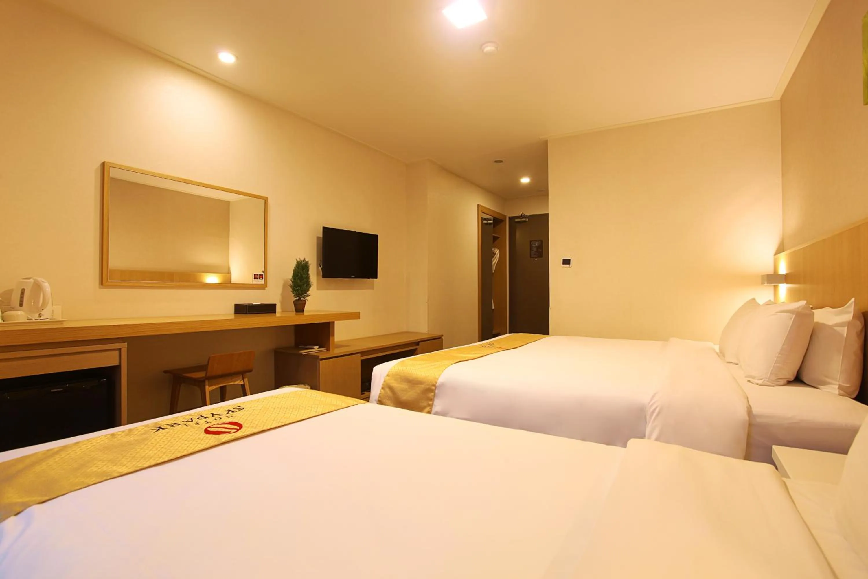 Bedroom, Bed in Hotel Skypark Jeju 1 Newly renovated