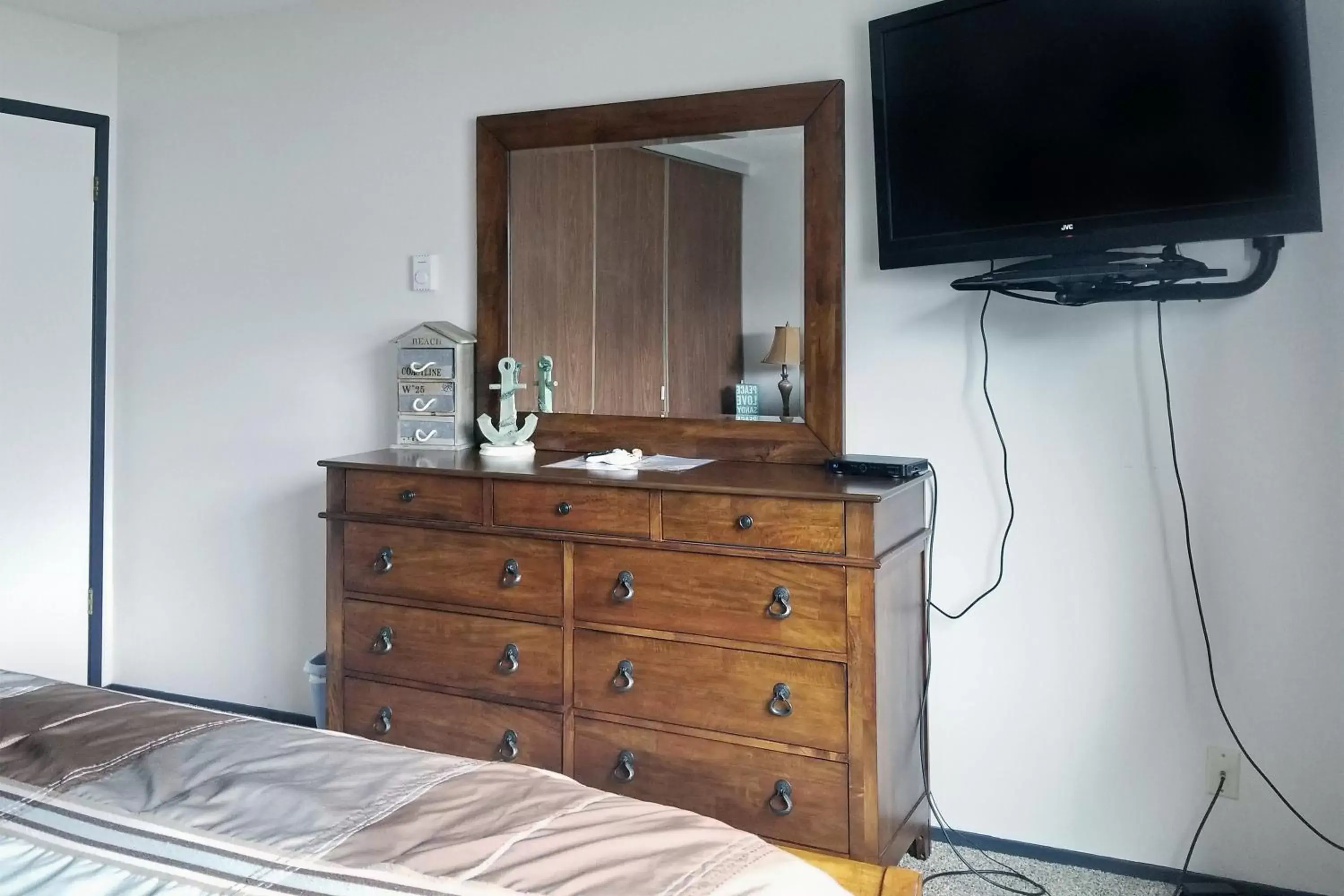 Bedroom, TV/Entertainment Center in Ocean Terrace Condominiums