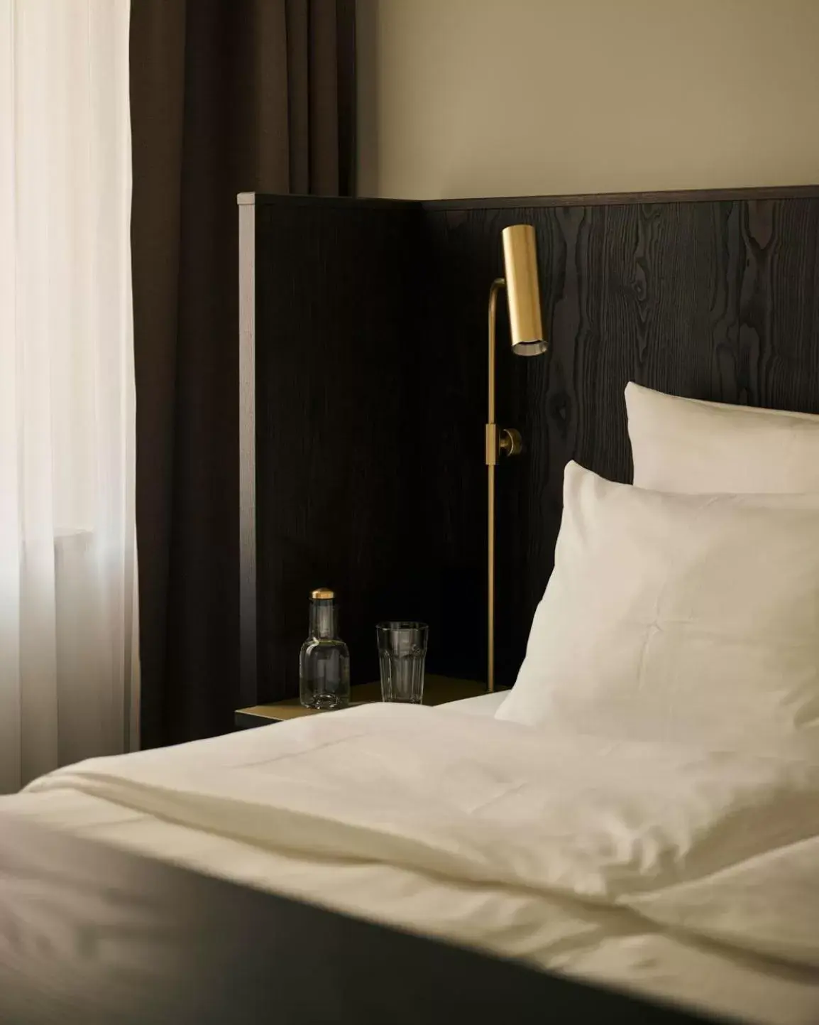 Bed in Melter Hotel & Apartments - a Neighborhood Hotel