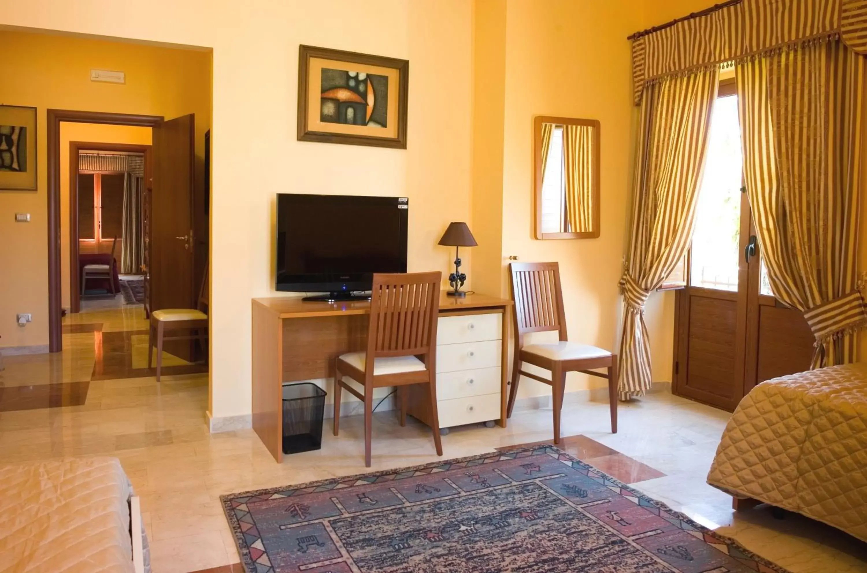 TV and multimedia, TV/Entertainment Center in B&B Villa Casablanca