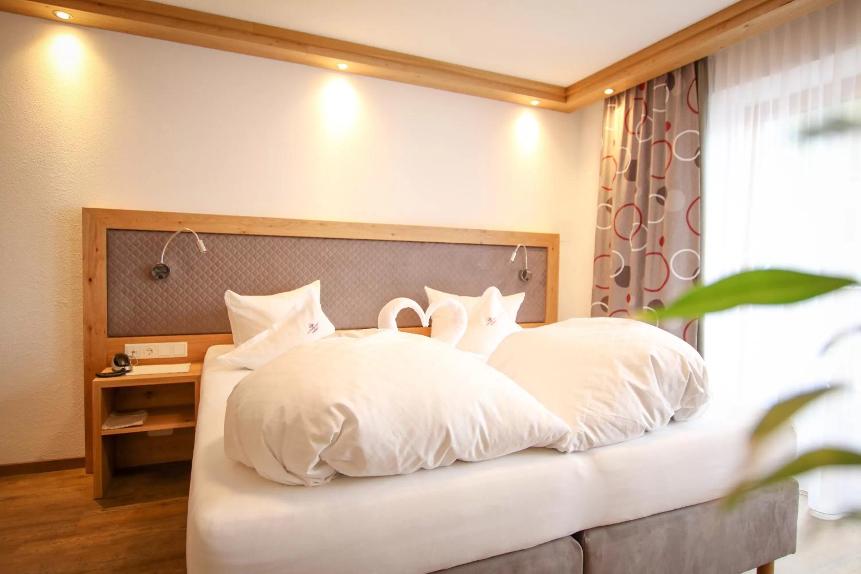 Bed in Hotel Schwarzer Adler