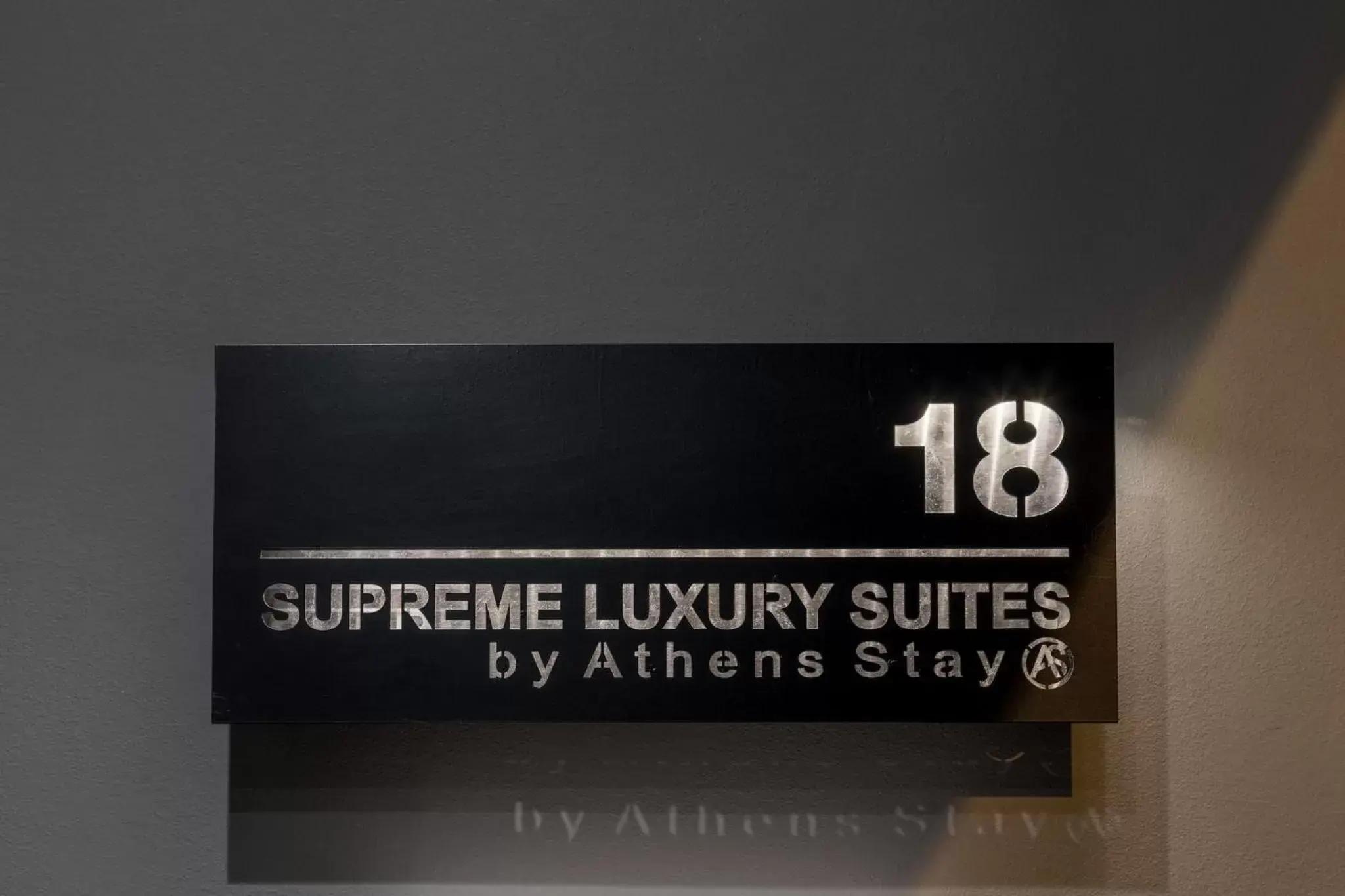 Property logo or sign in Supreme Luxury Suites by Athens Stay