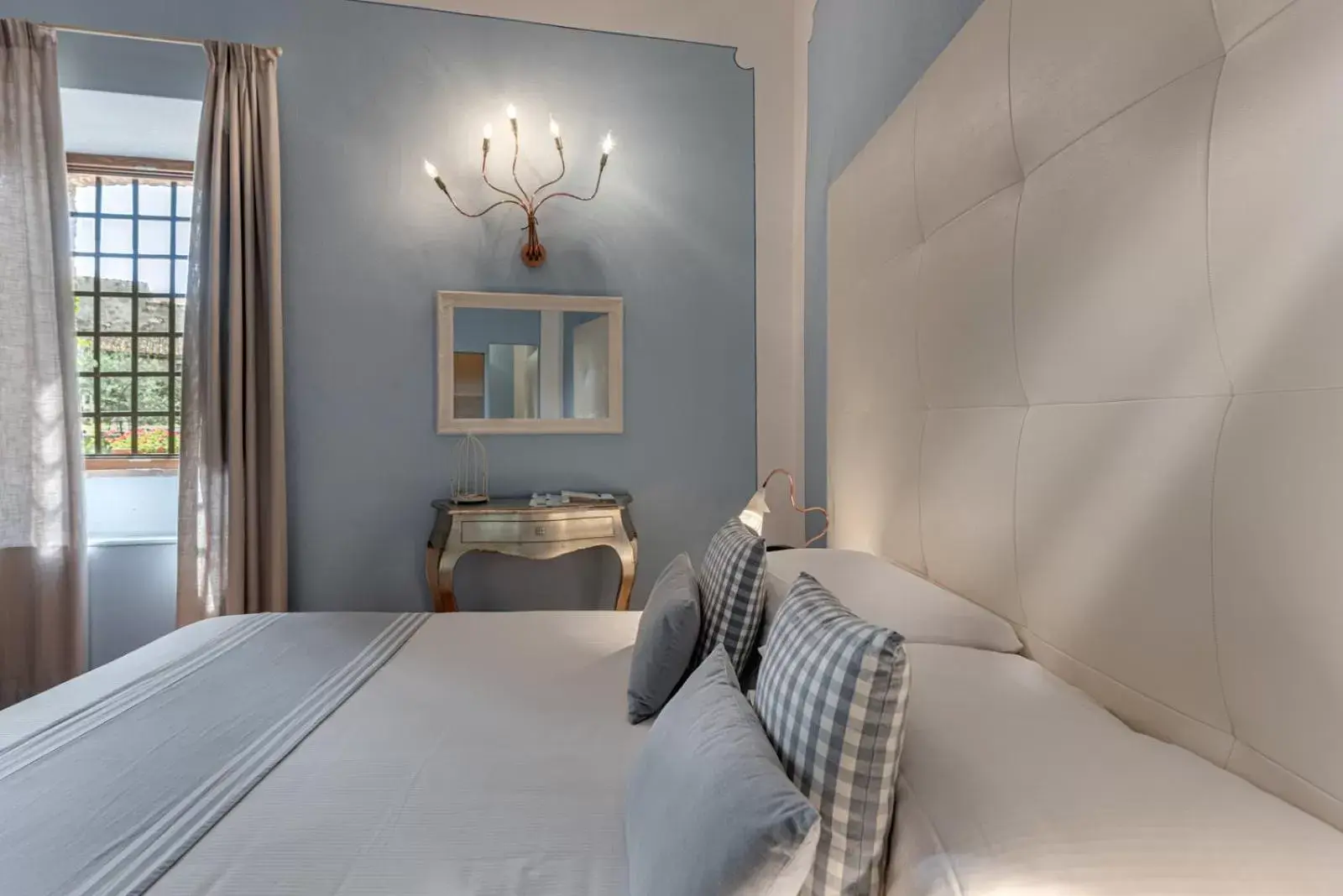 Bed in PALAZZO DEL CAPITANO Wellness & Relais - Luxury Borgo Capitano Collection