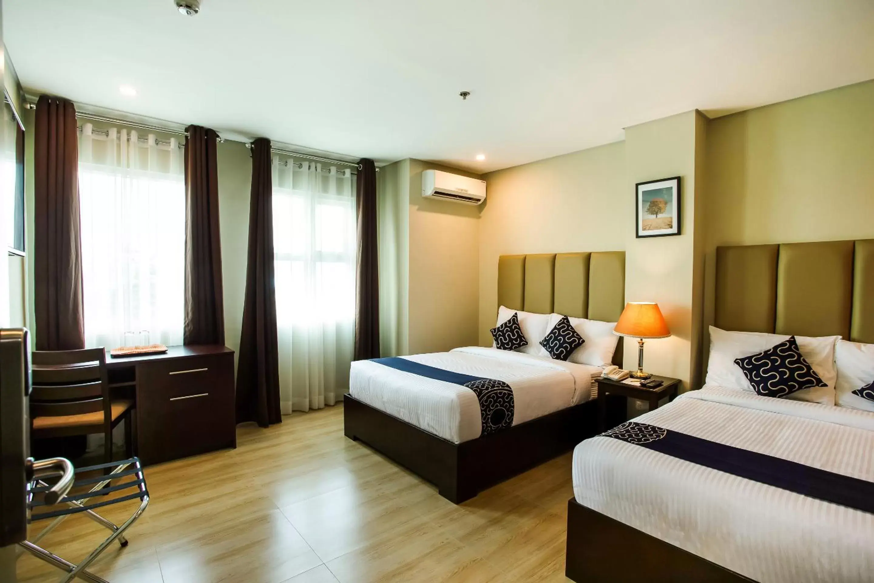 Bedroom, Bed in Capital O 461 Asrodel Hotel