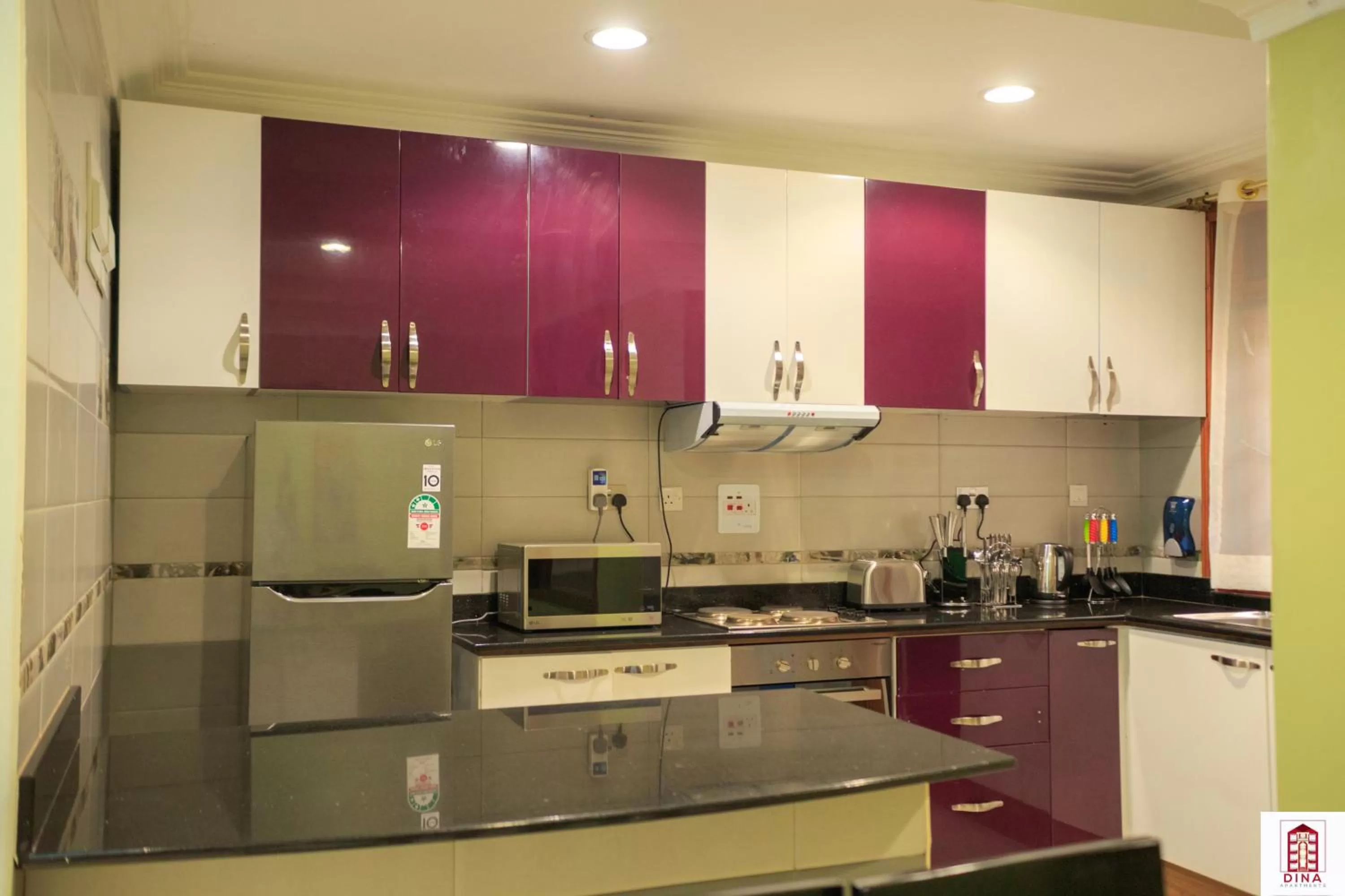Kitchen or kitchenette in Dina Apartments