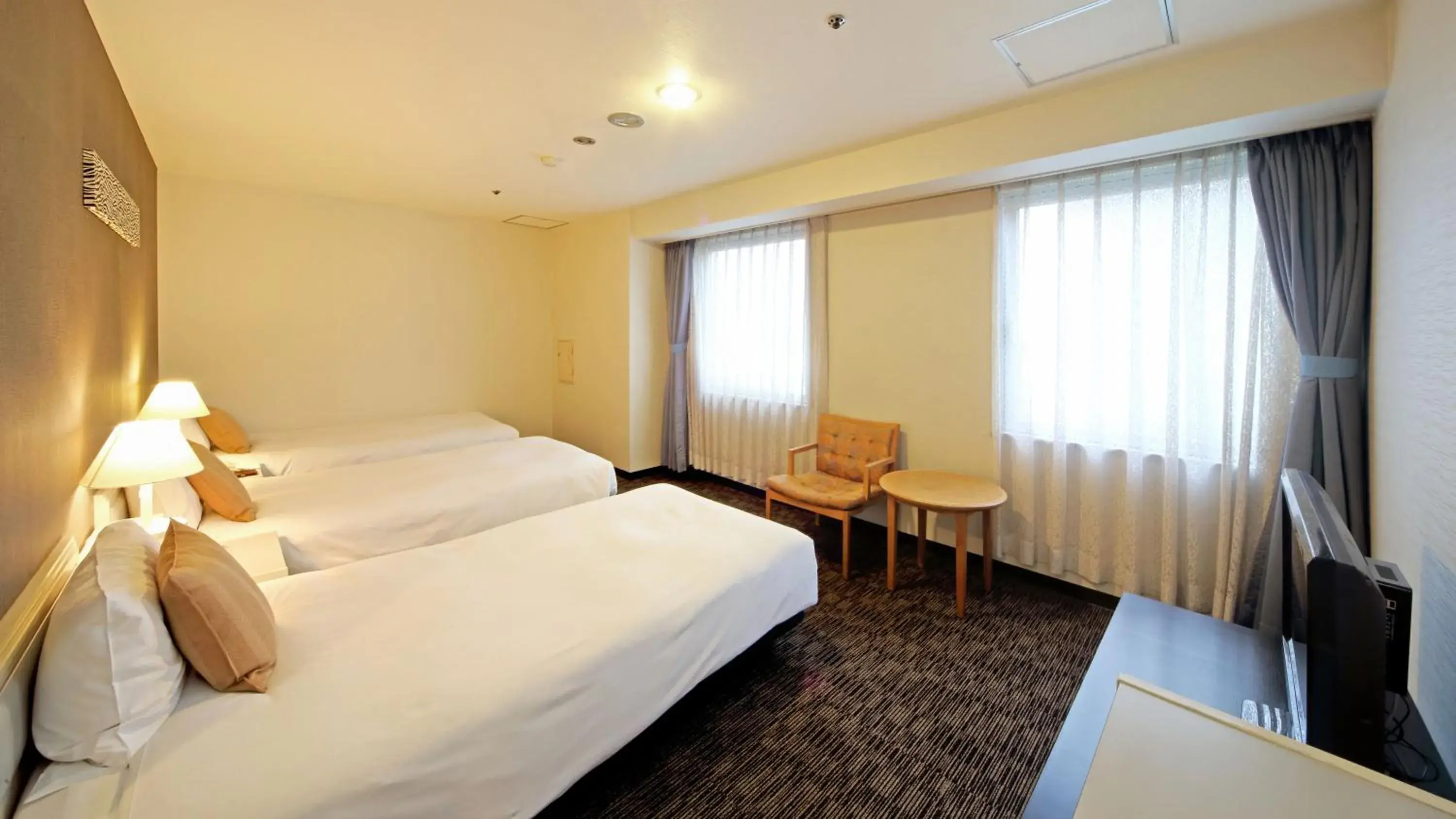 Bed in Asahikawa Toyo Hotel