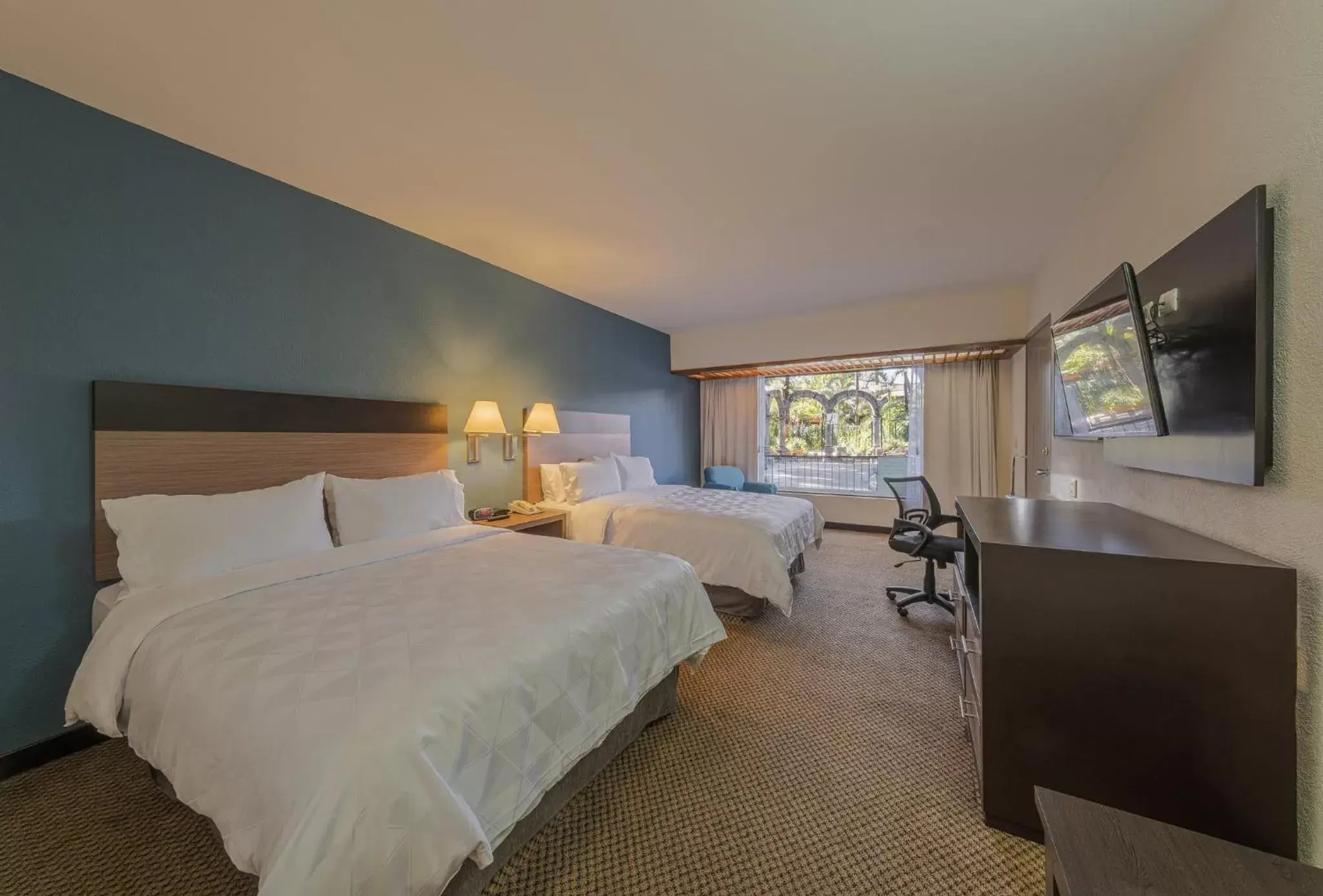 Standard Double Room with Two Double Beds and Pool View in Holiday Inn Guadalajara Expo Plaza del Sol by IHG Standard Double Room with Two Double Beds and Pool View in Holiday Inn Guadalajara Expo Plaza del Sol by IHG