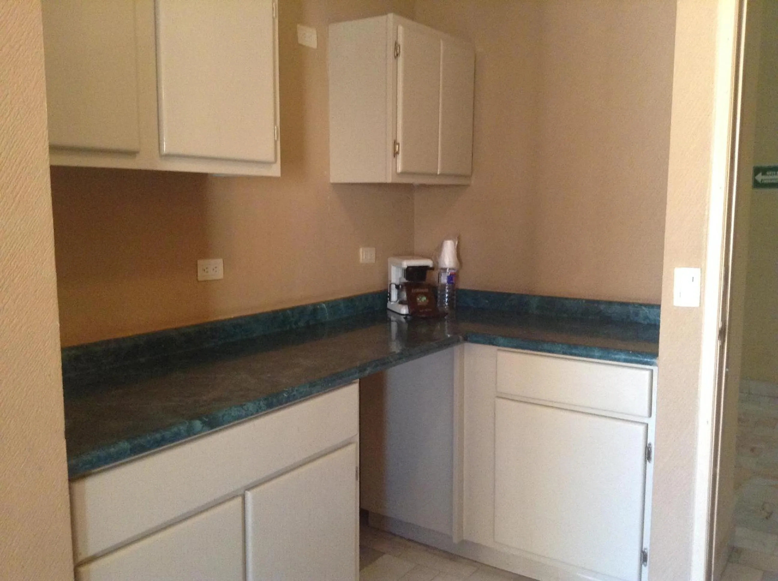 Kitchen or kitchenette in Los Jitos Hotel & Suites