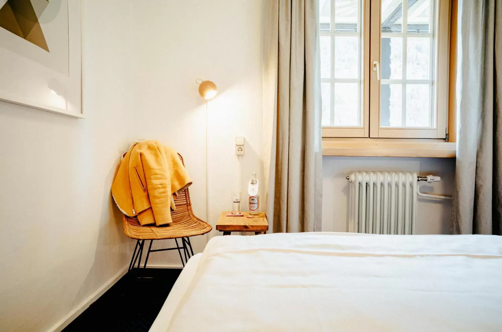 Seating area, Bed in Alpenrose Bayrischzell Hotel