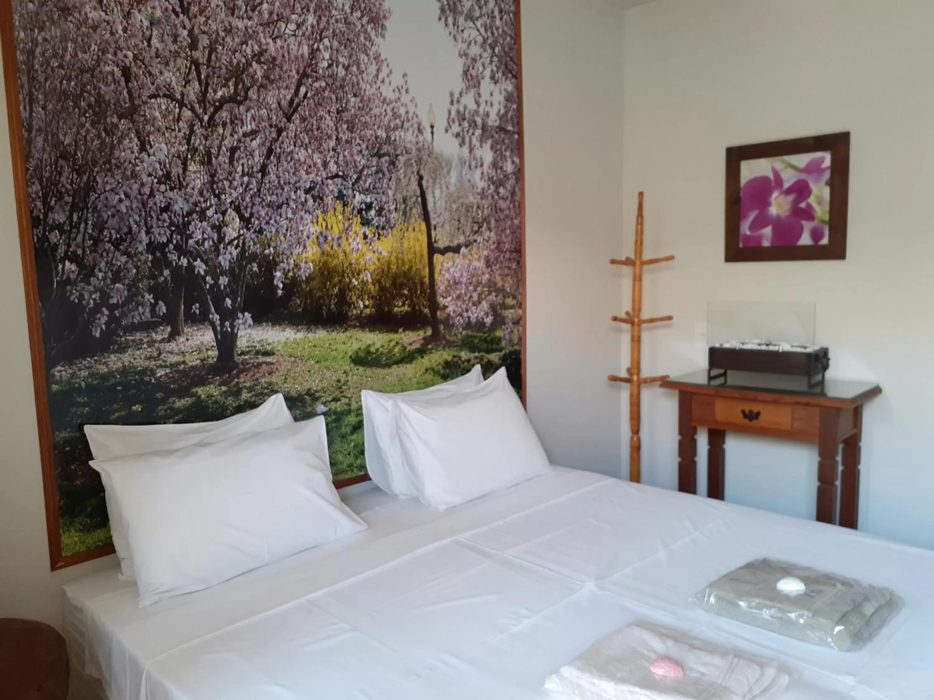 Bed in Pousada R.N.C. Nosso Paraíso