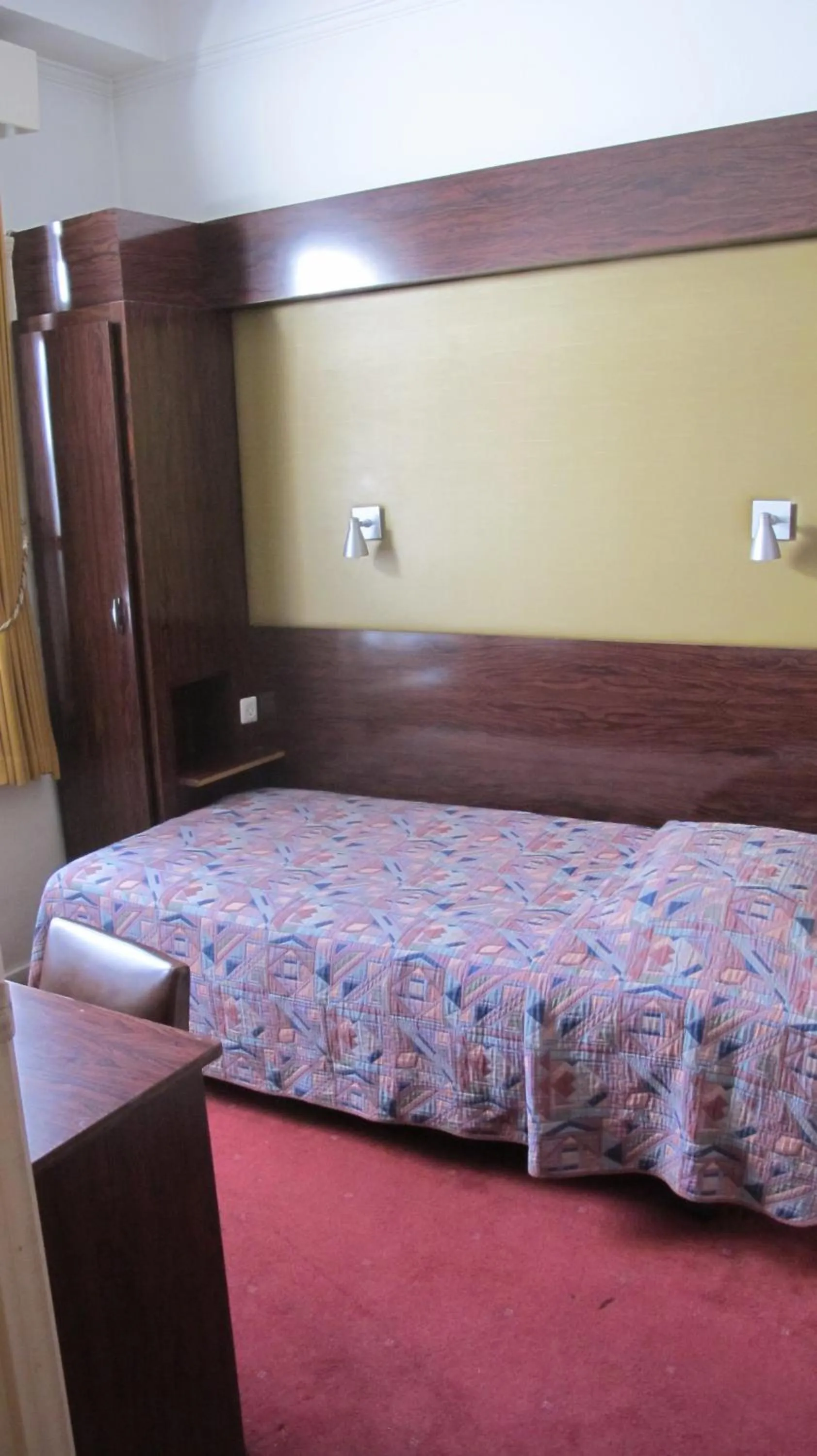 Bed in Hotel Manhattan