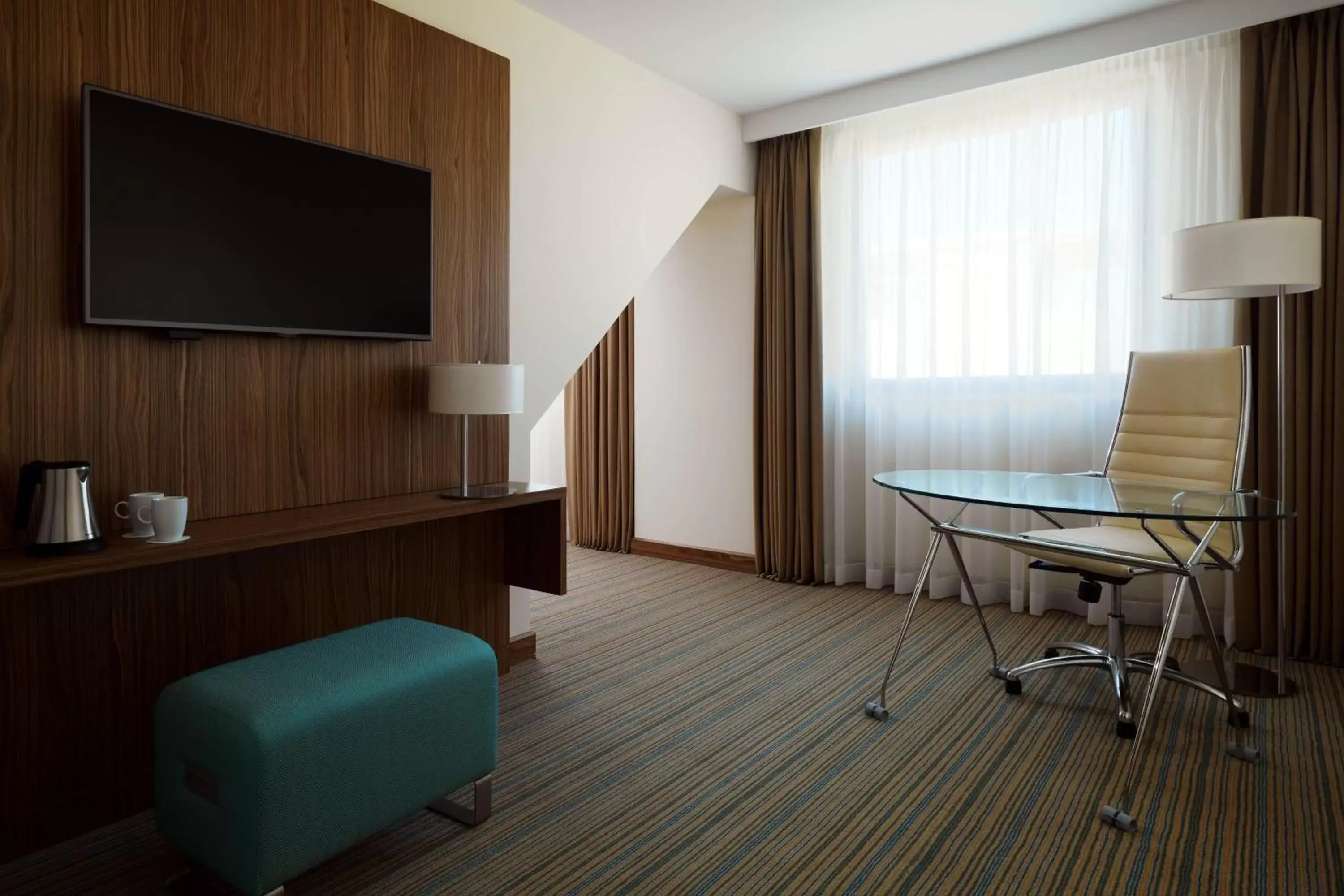 Living room, TV/Entertainment Center in Courtyard by Marriott Belgrade City Center