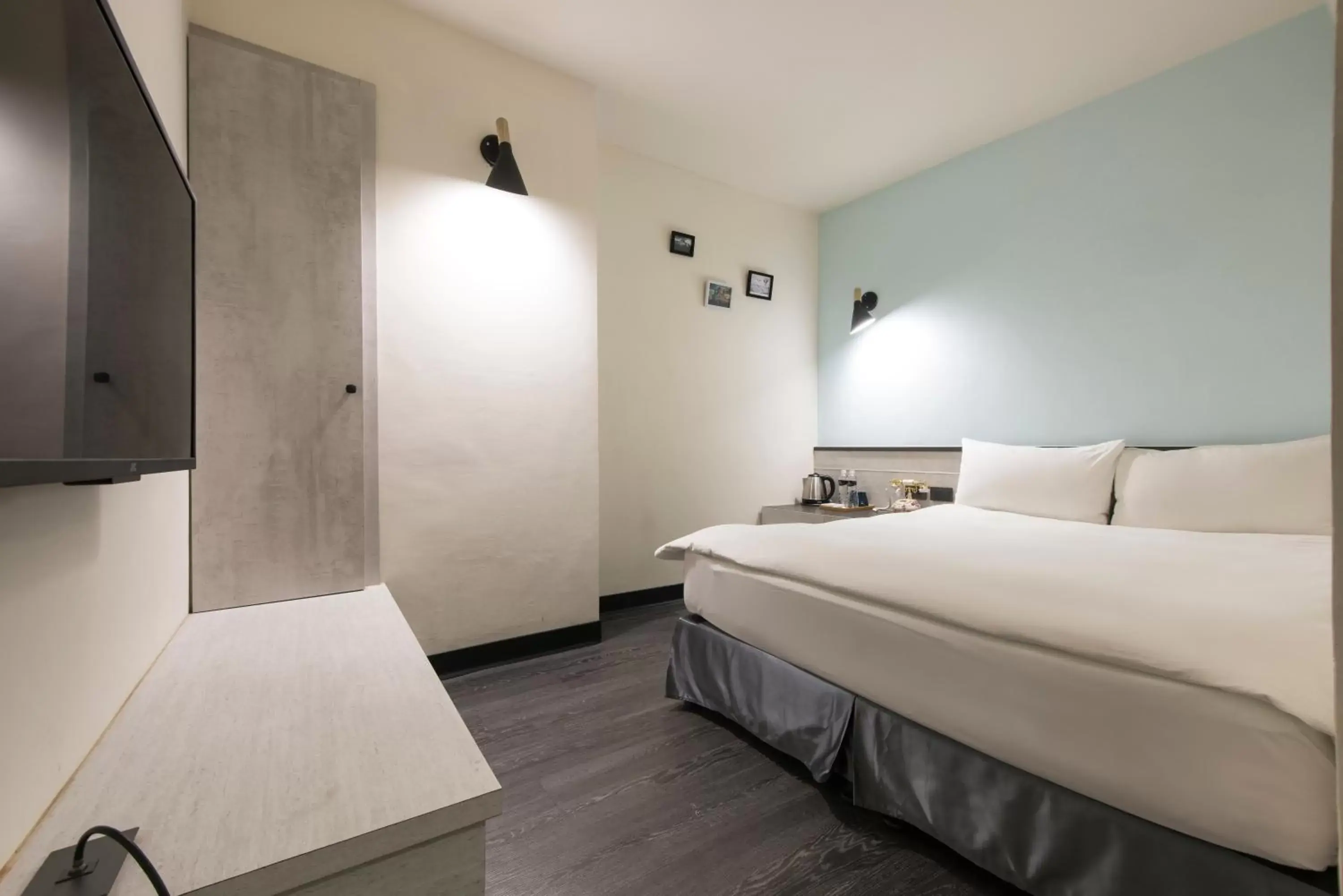 Bed in Raise Hotel Taichung