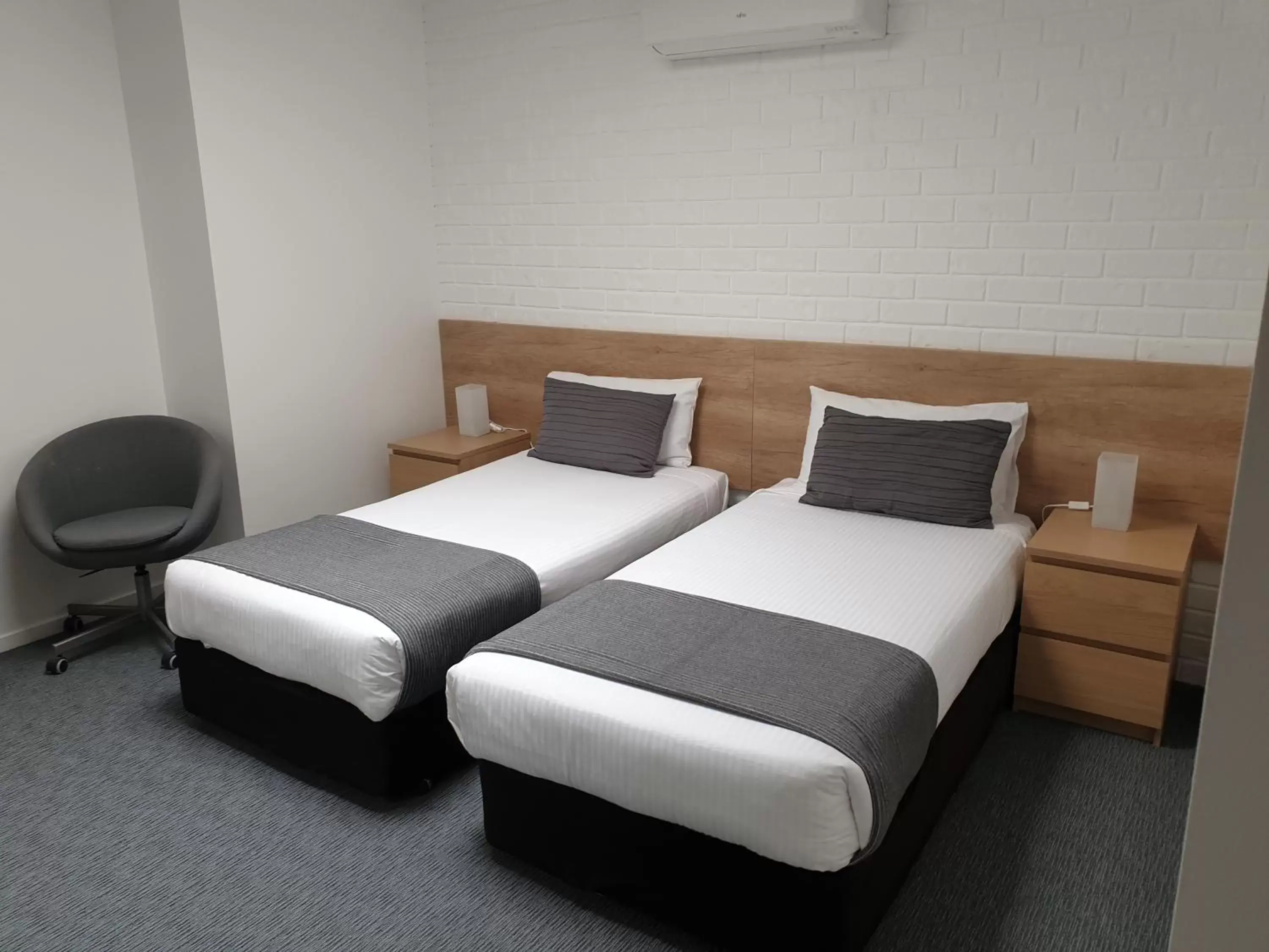 Bed in Twofold Bay Motor Inn