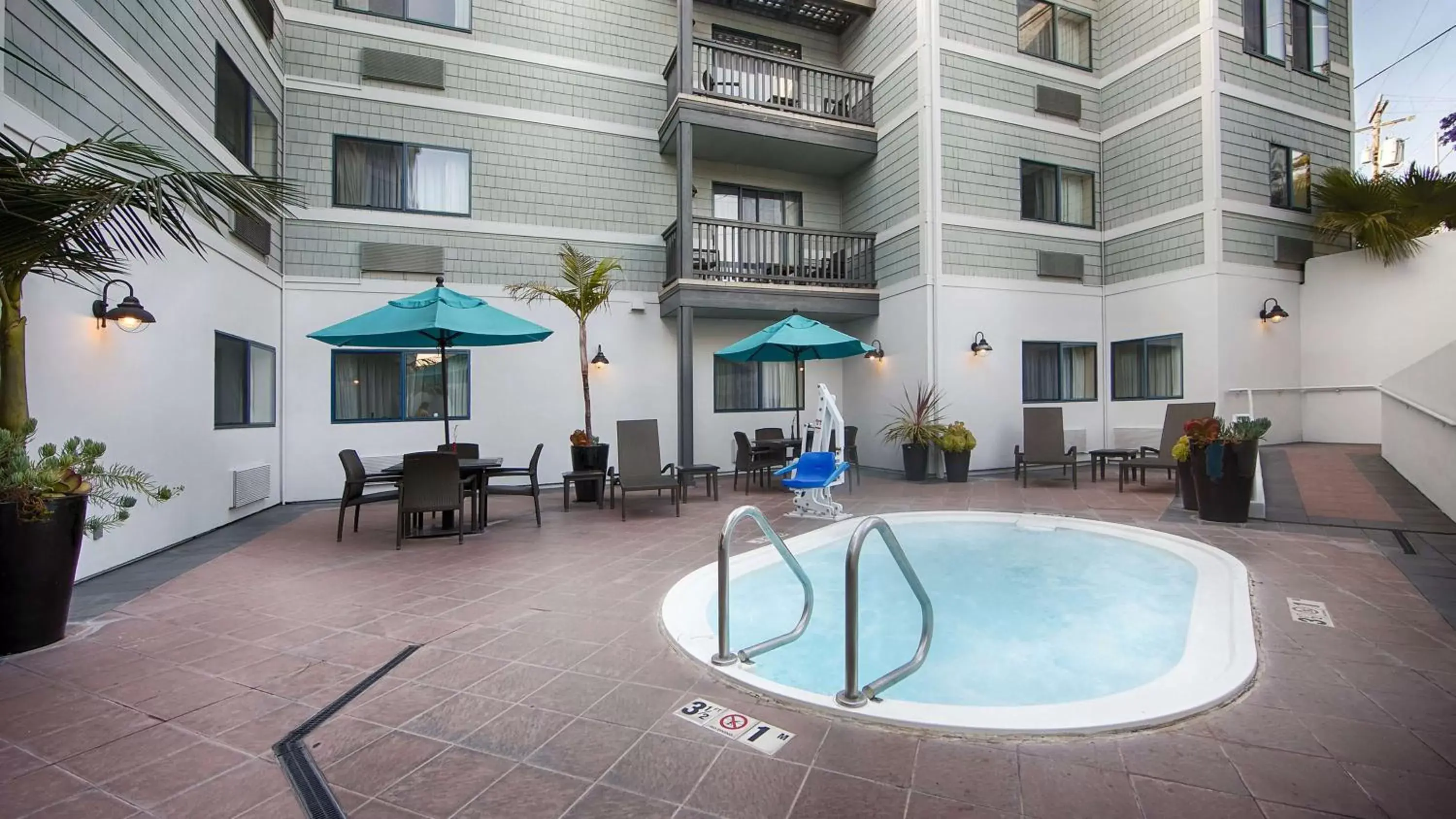 Patio, Swimming Pool in Best Western Plus All Suites Inn