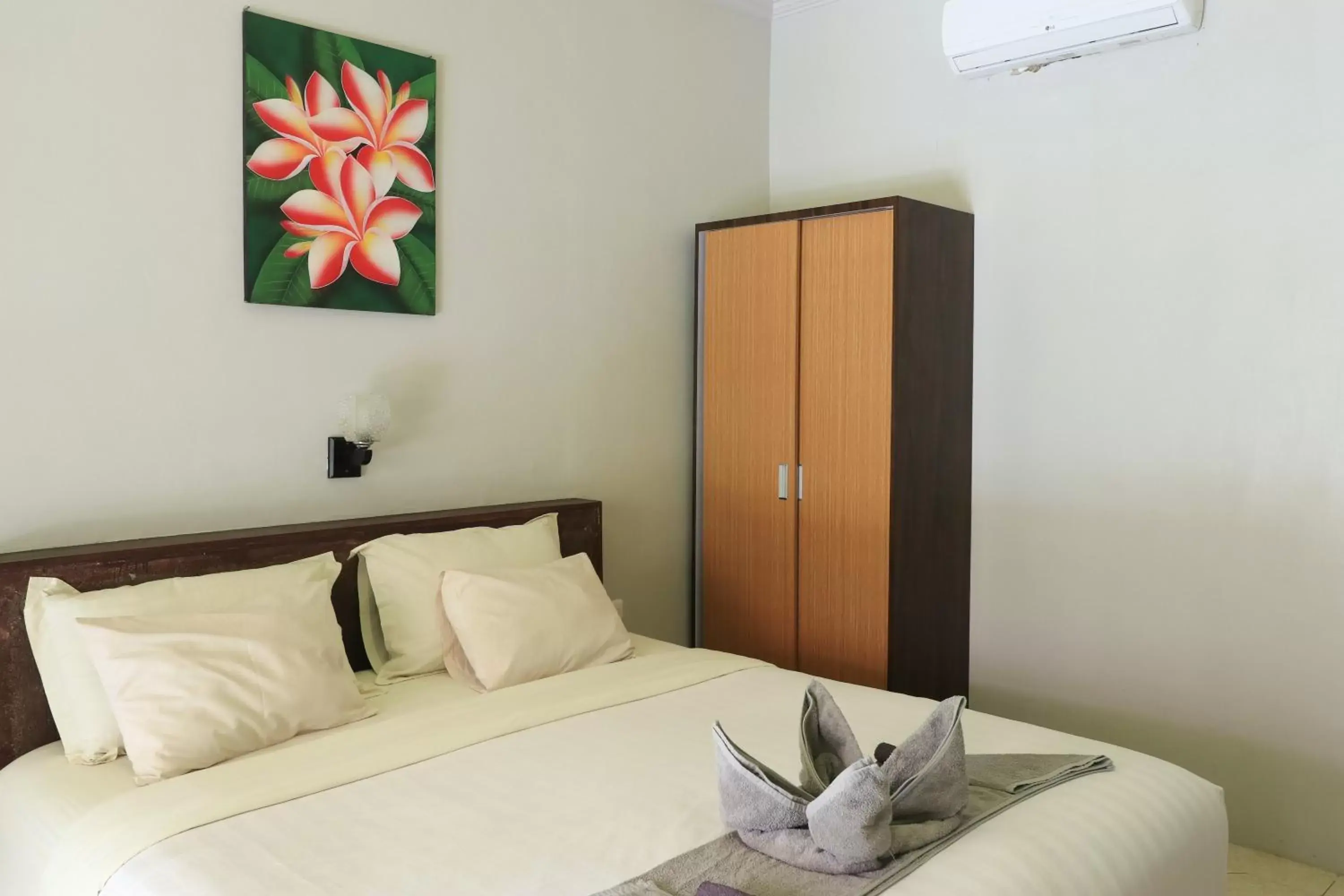 Bedroom, Bed in Senggigi Cottages Lombok