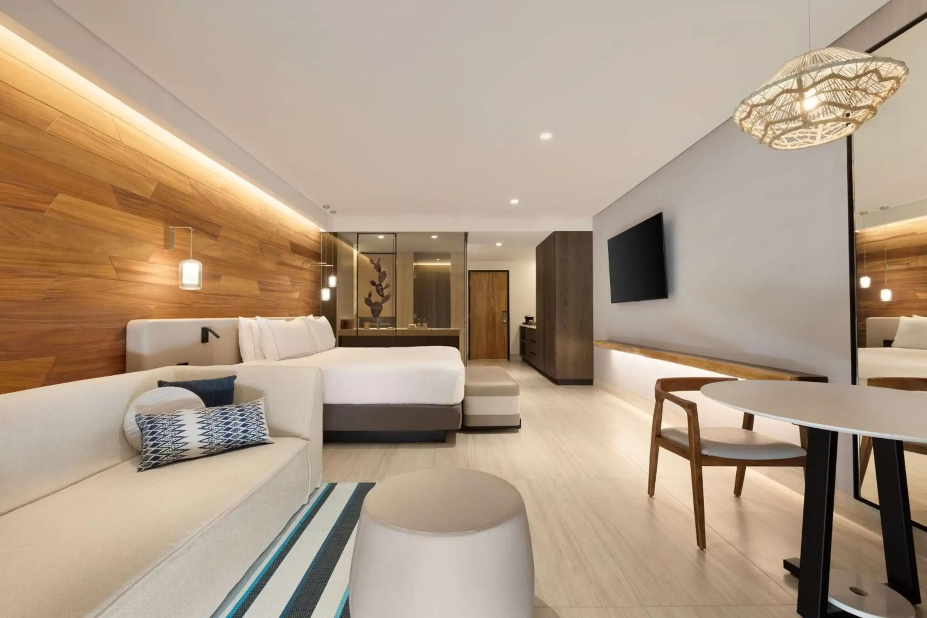 Living room, TV/Entertainment Center in Hilton Cancun, an All-Inclusive Resort