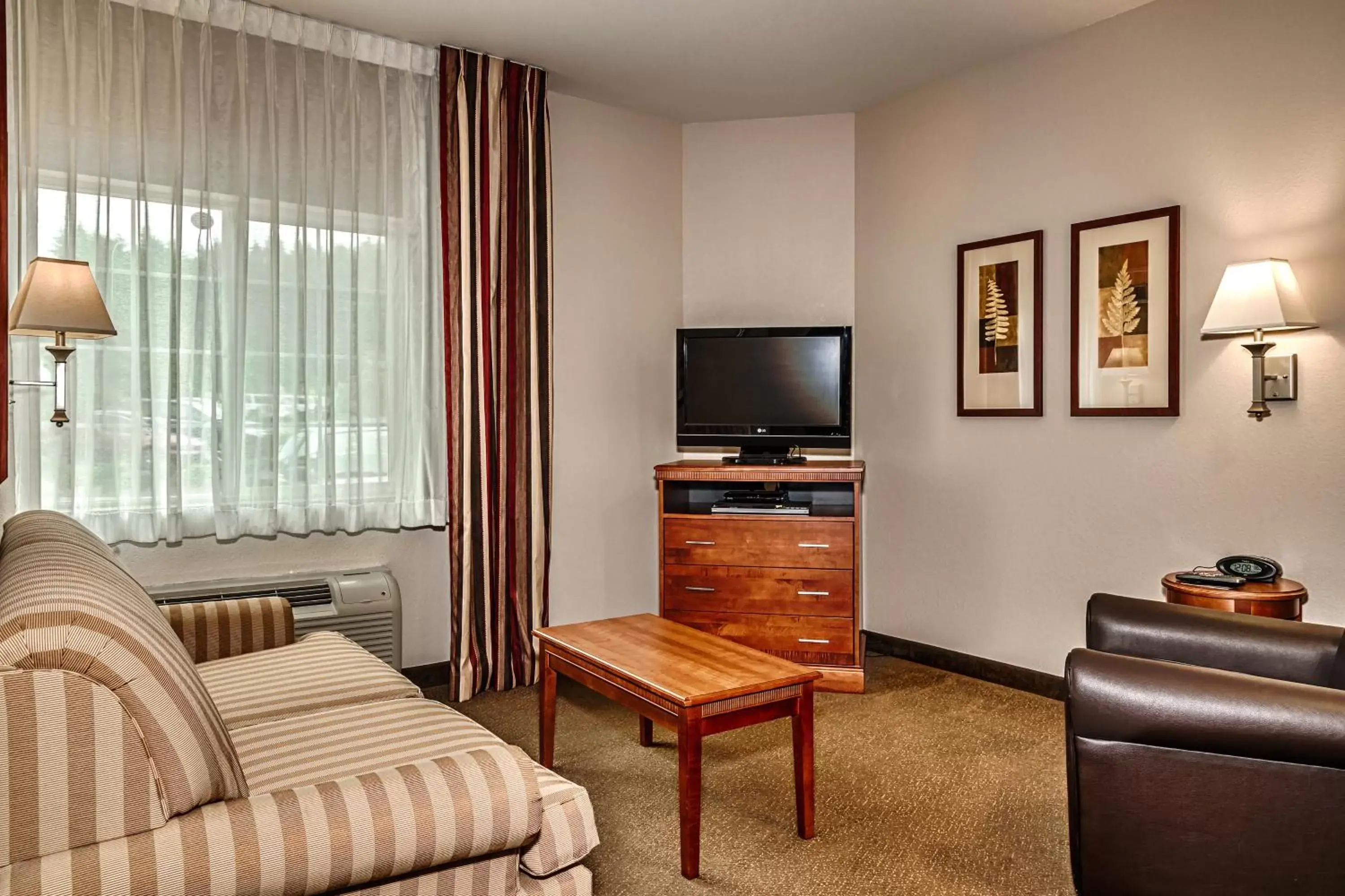 Photo of the whole room, Seating Area in Candlewood Suites Oak Harbor, an IHG Hotel