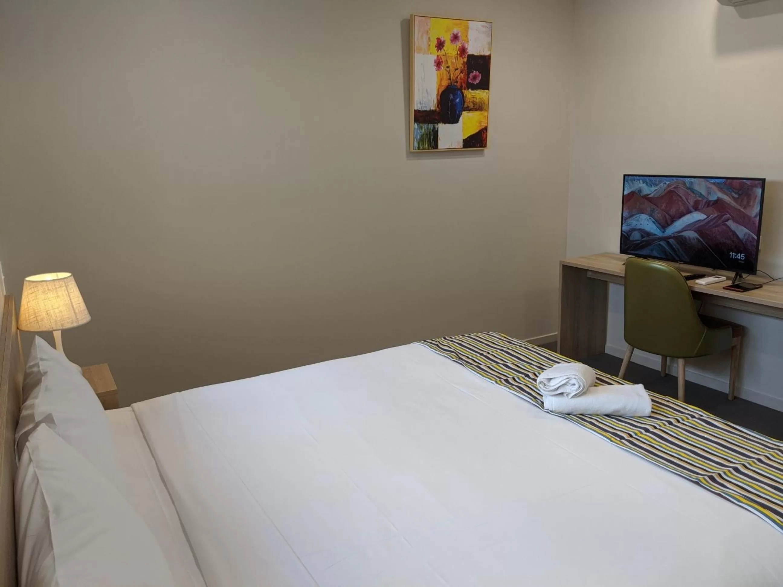 Bed in The Windsor, Hotel Rooms & Apartments