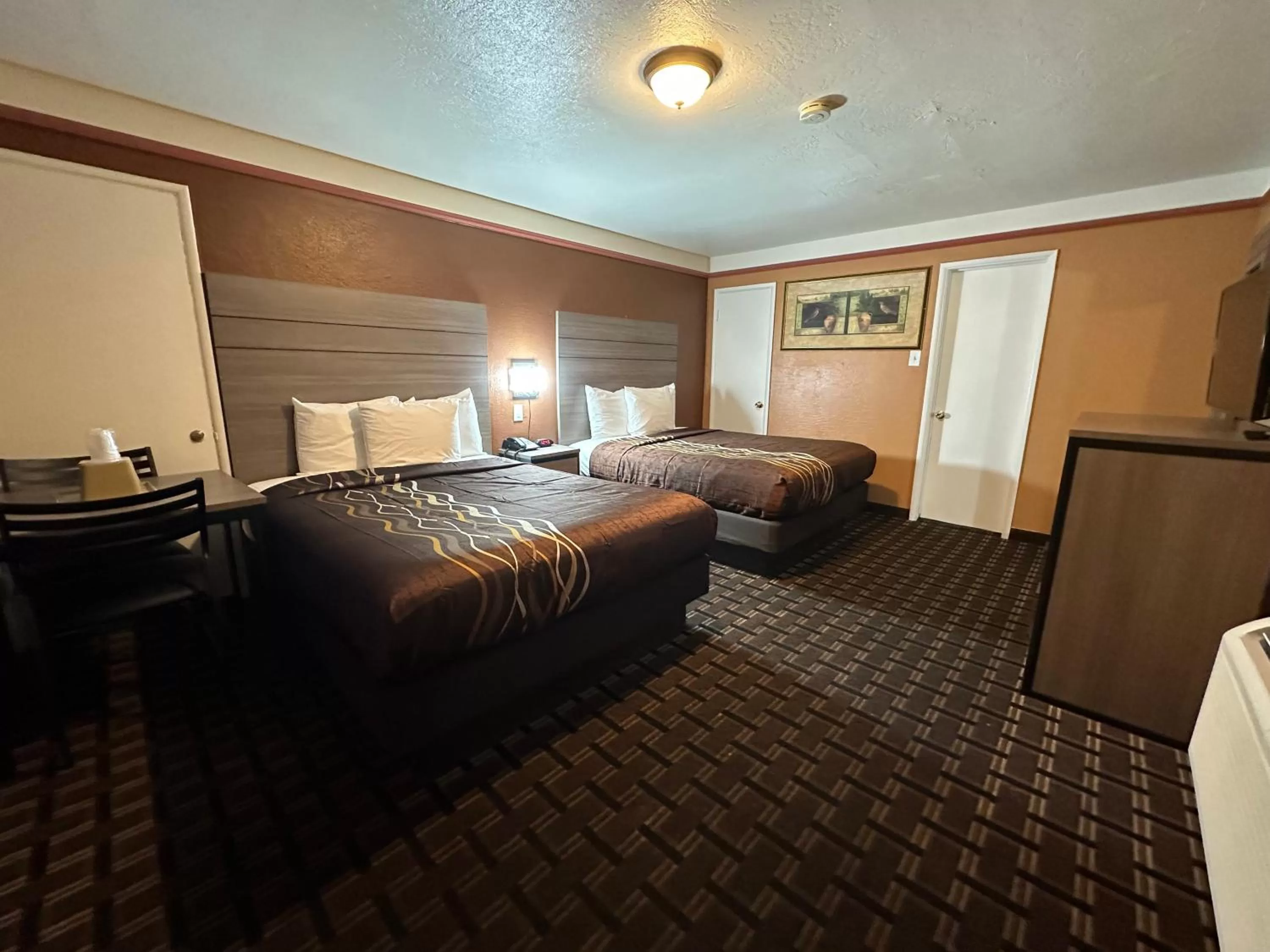 Bed in New Corral Motel