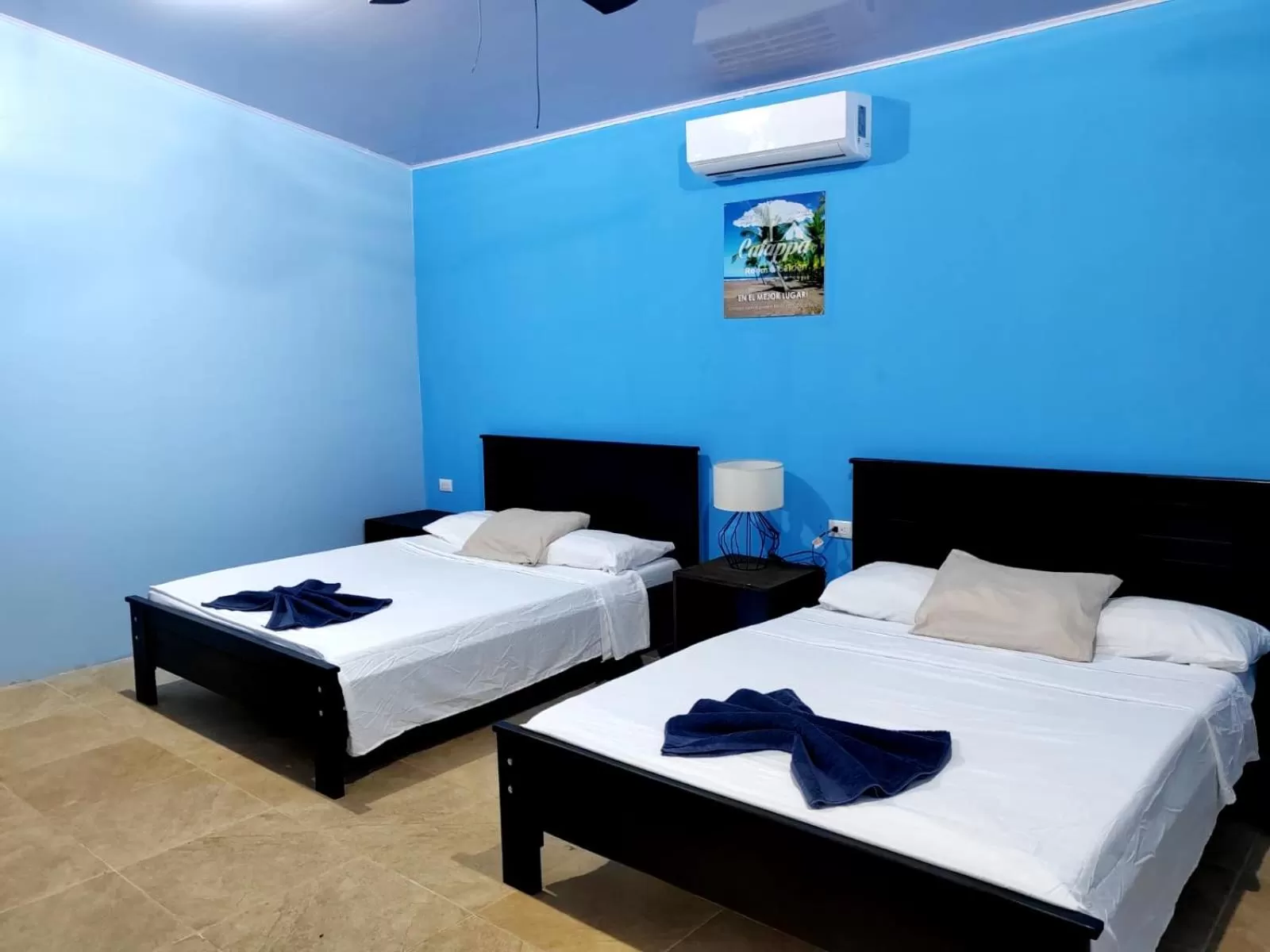 Property building, Bed in Hotel Catappa