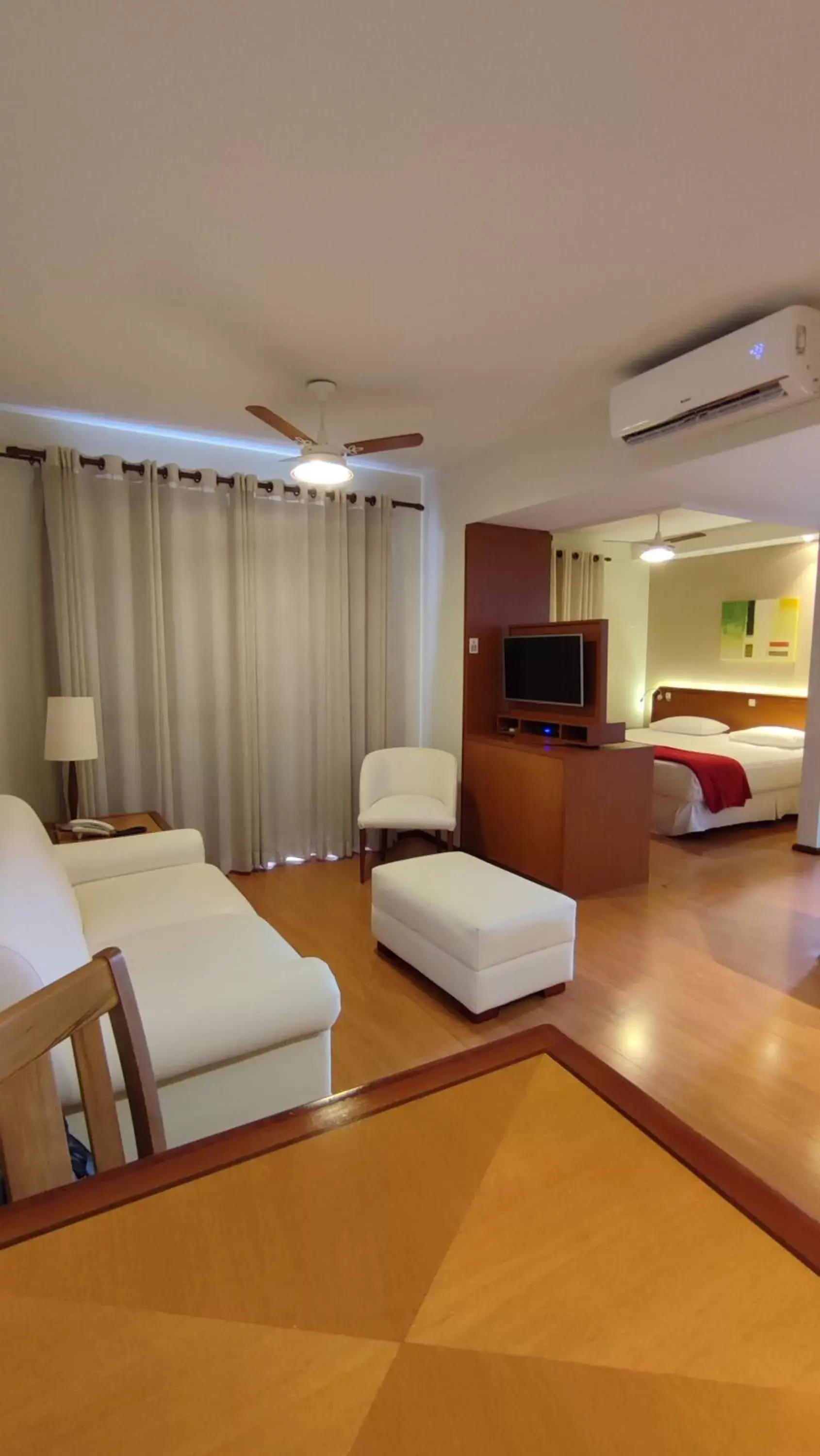 Living room in New Life Piracicaba by Atlantica