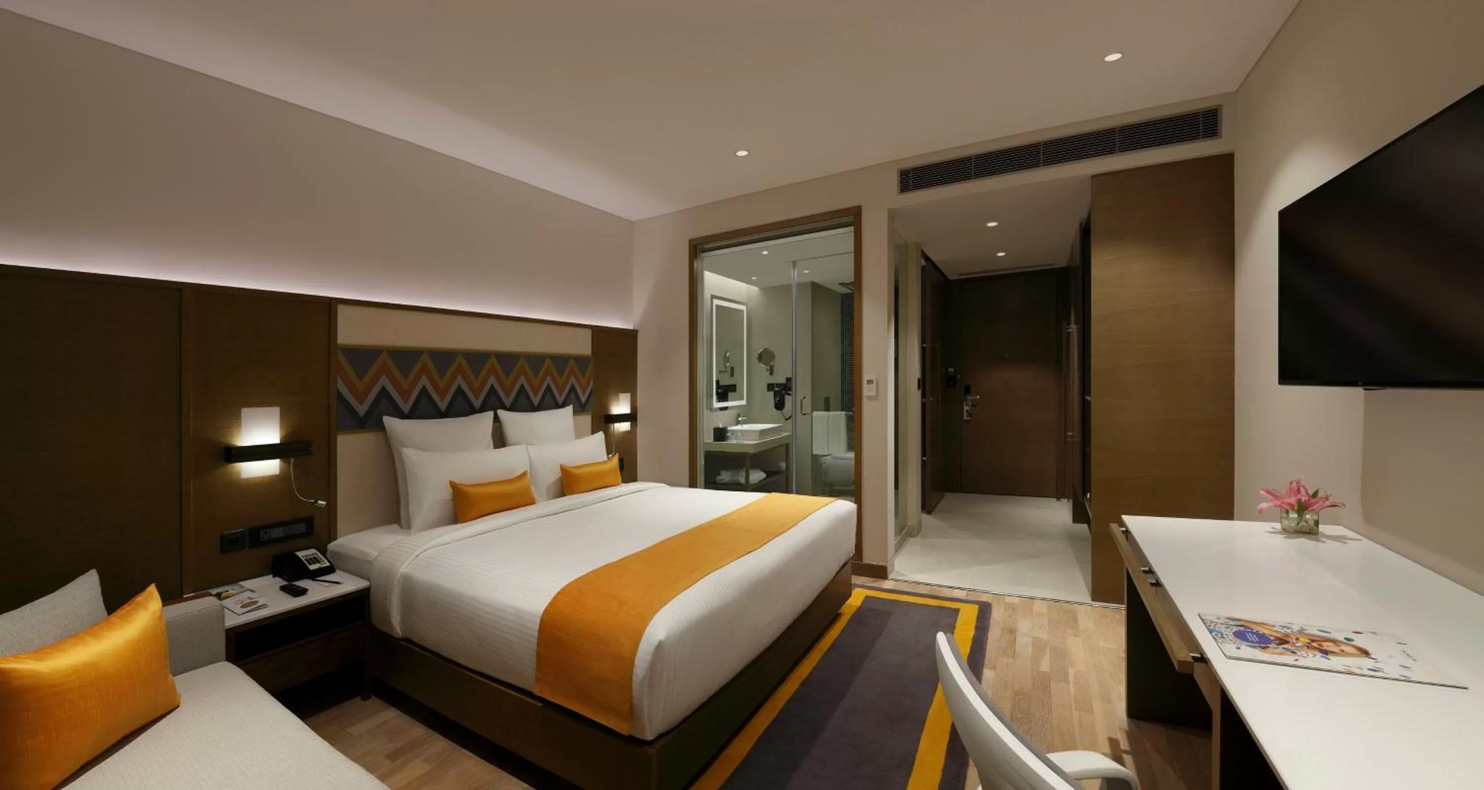 Photo of the whole room, Bed in Novotel Guwahati GS Road
