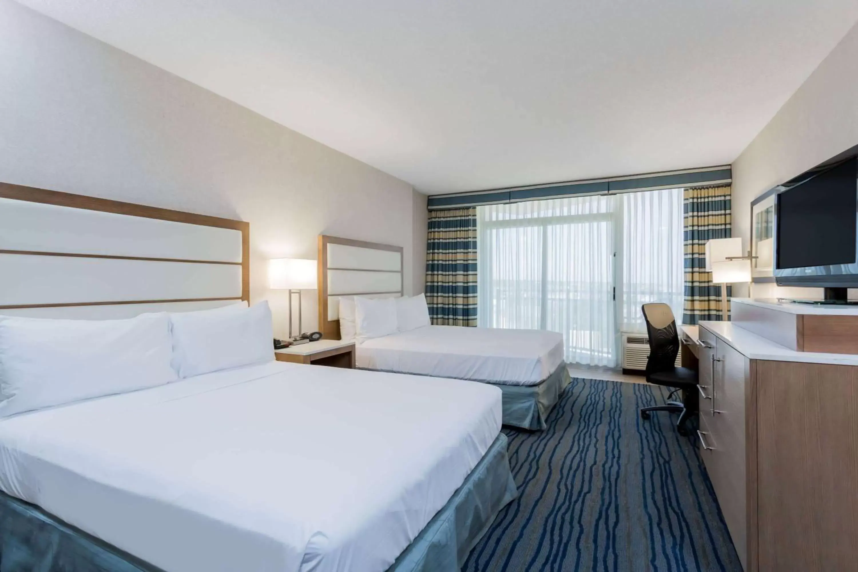 Photo of the whole room, Bed in Wyndham Virginia Beach Oceanfront